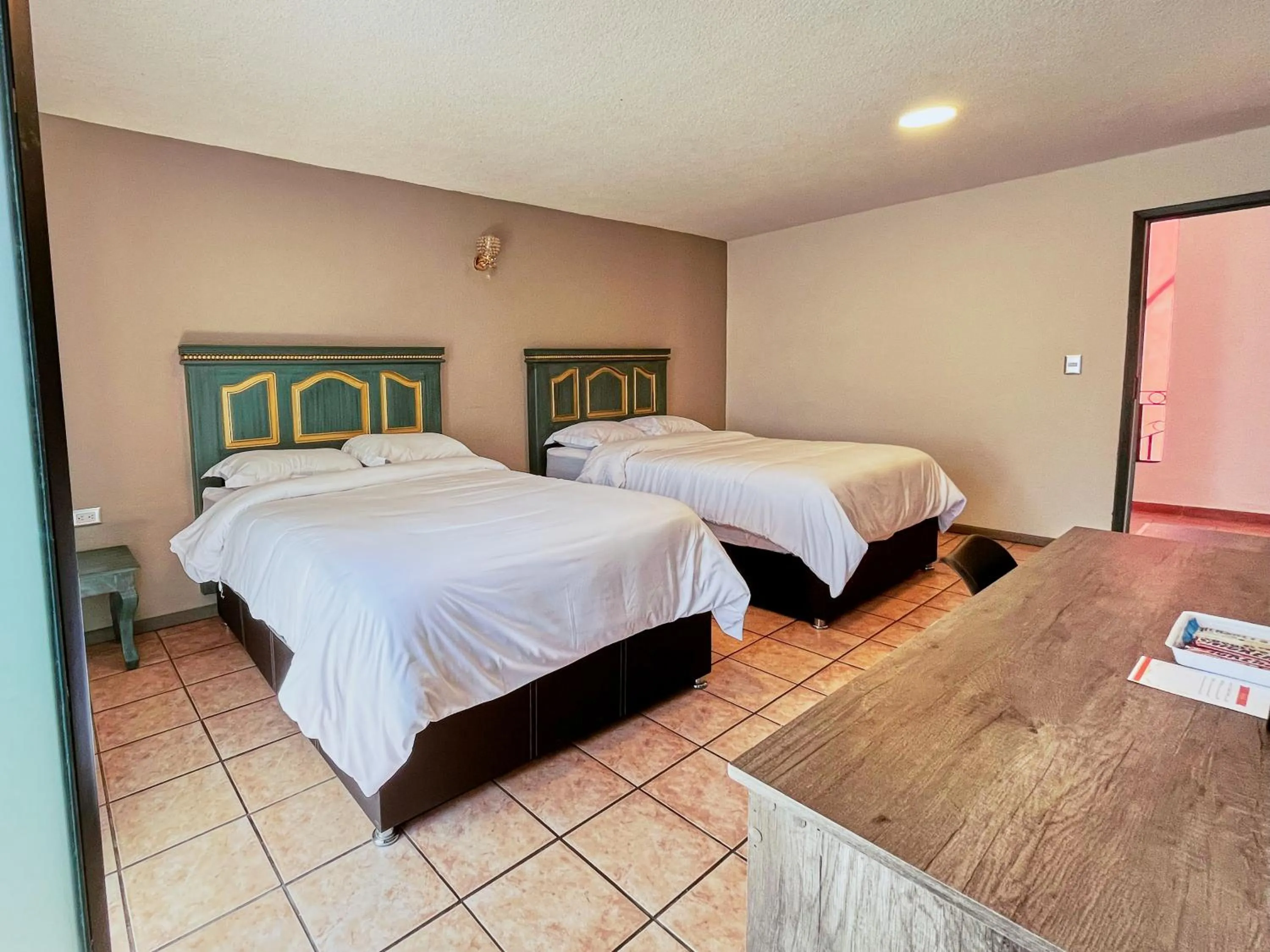 Bed in Hotel Casa Real Cholula