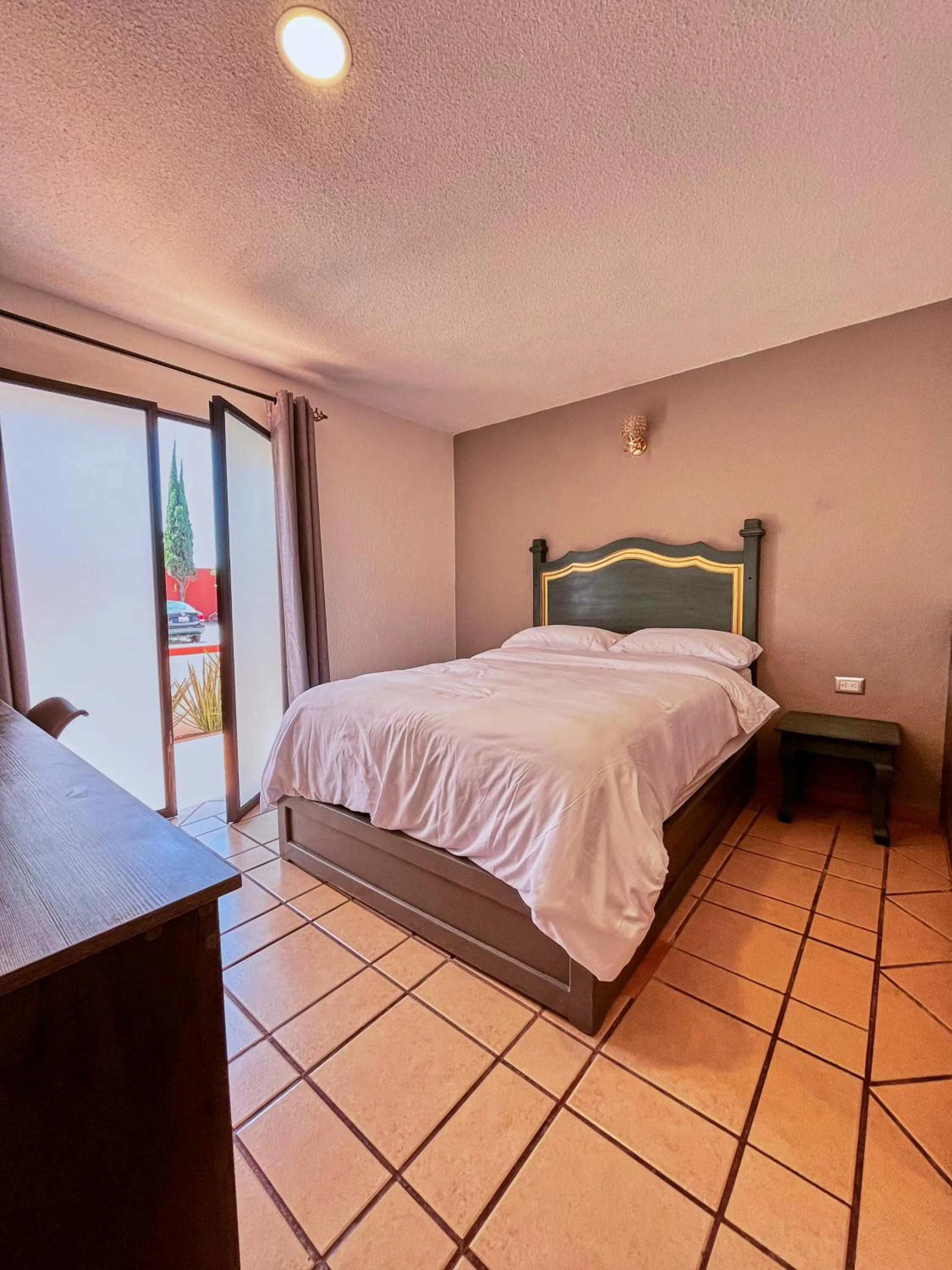 Bed in Hotel Casa Real Cholula