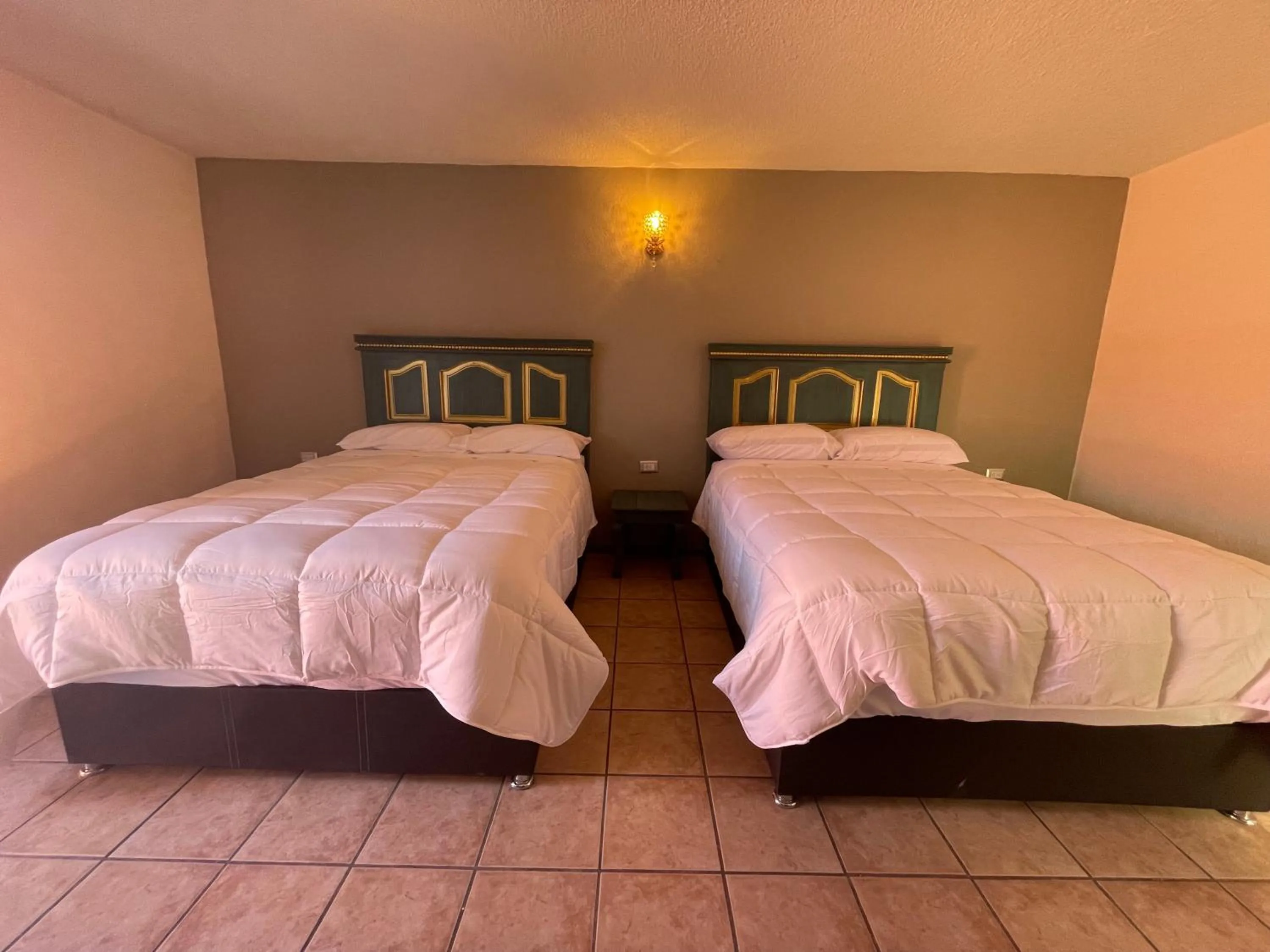 Bed in Hotel Casa Real Cholula