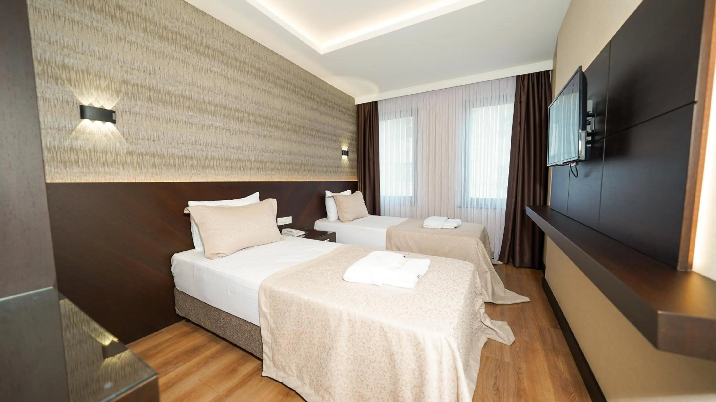 Bed in Bellezza Hotel