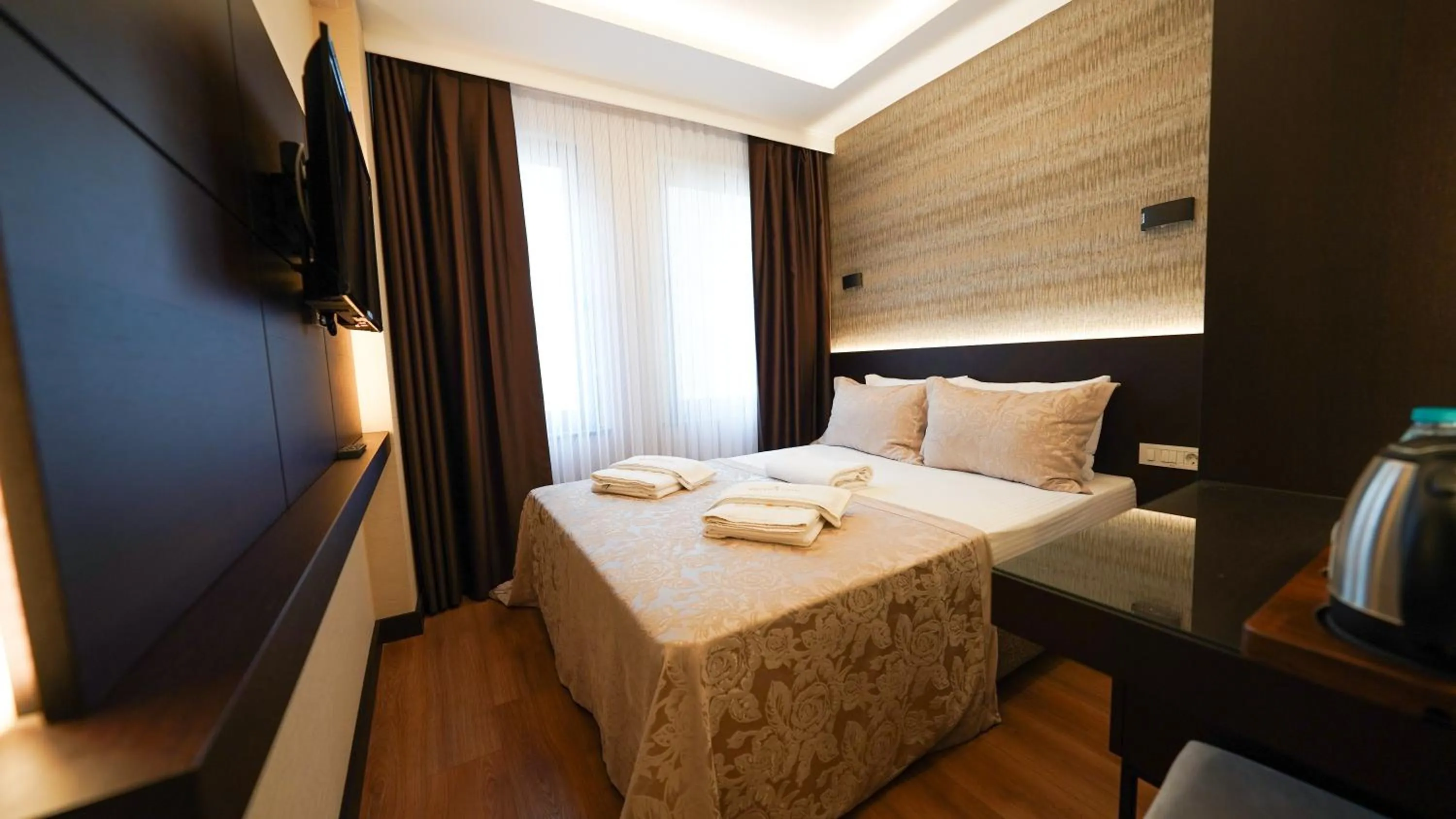 Bed in Bellezza Hotel