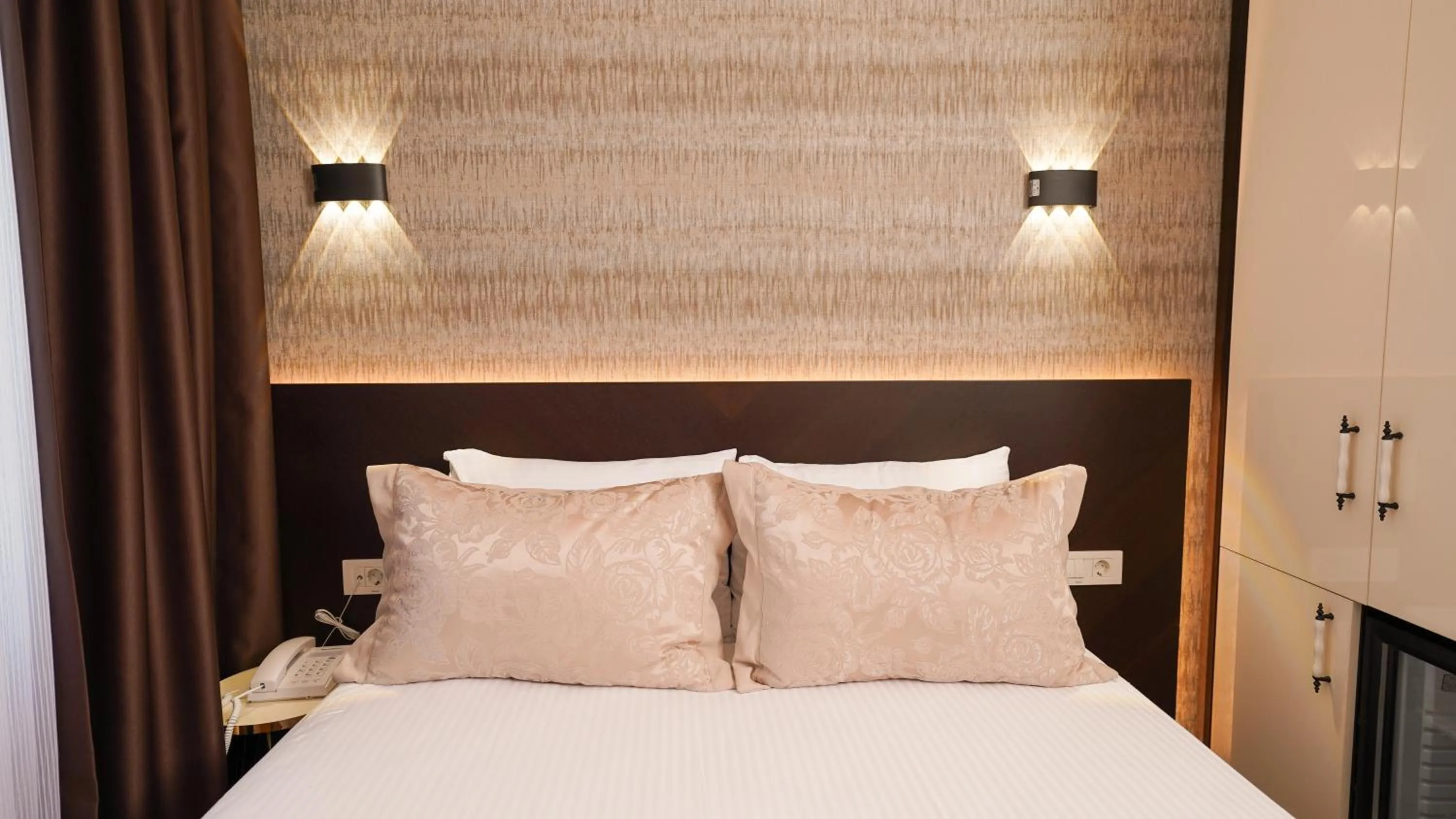 Bed in Bellezza Hotel