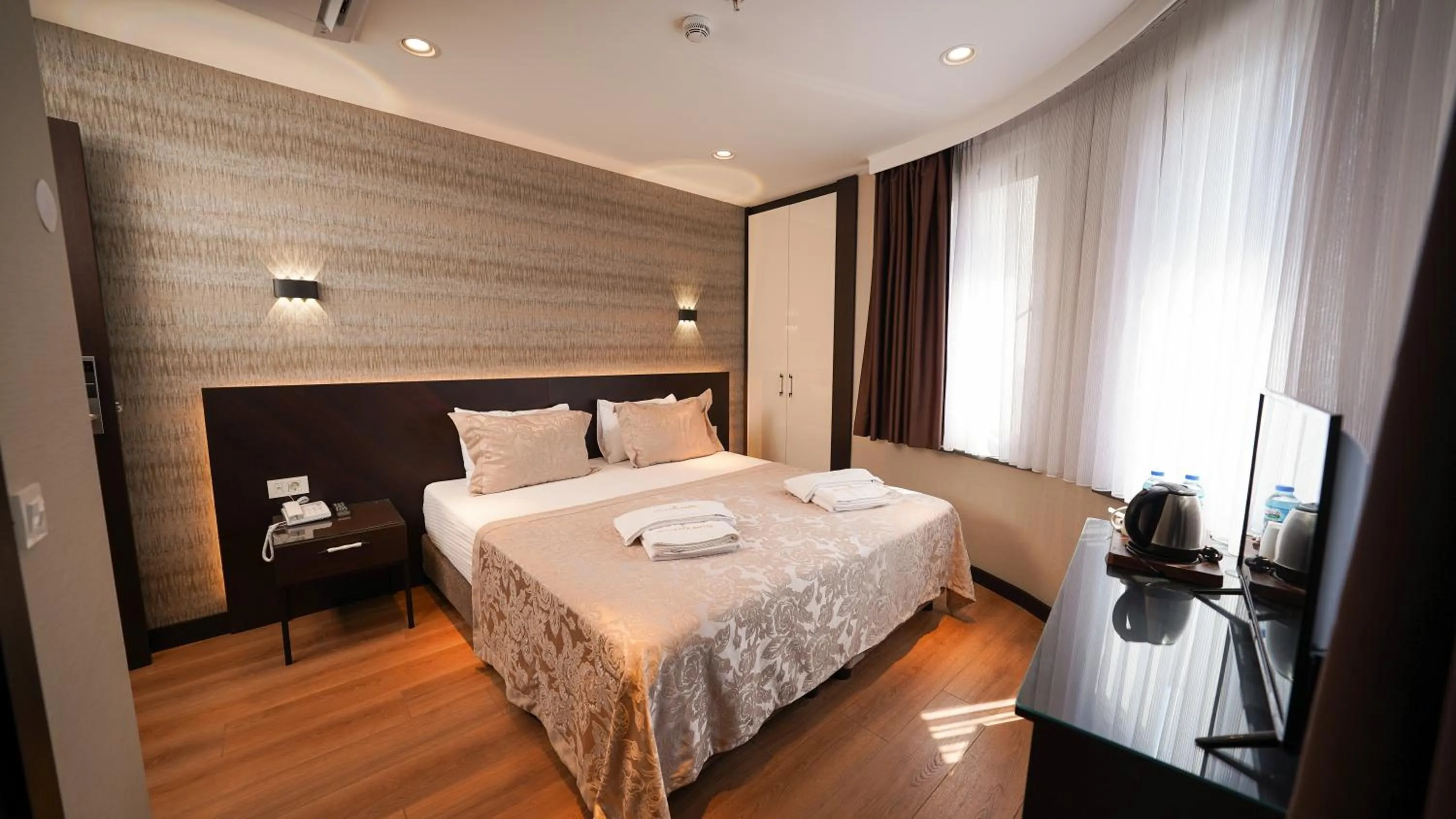 Bed in Bellezza Hotel