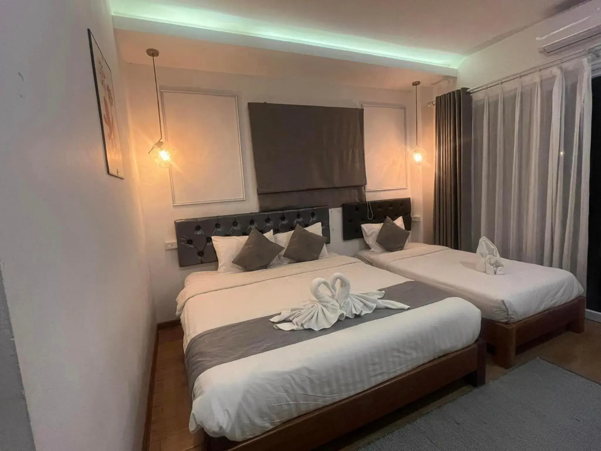 Triple Room in VangVieng Crystal Boutique Hotel Triple Room in VangVieng Crystal Boutique Hotel