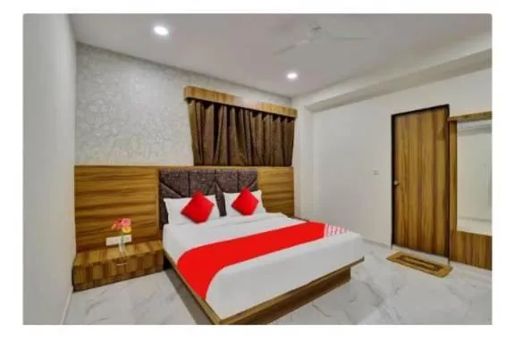 Bed in hotel stay inn Bopal