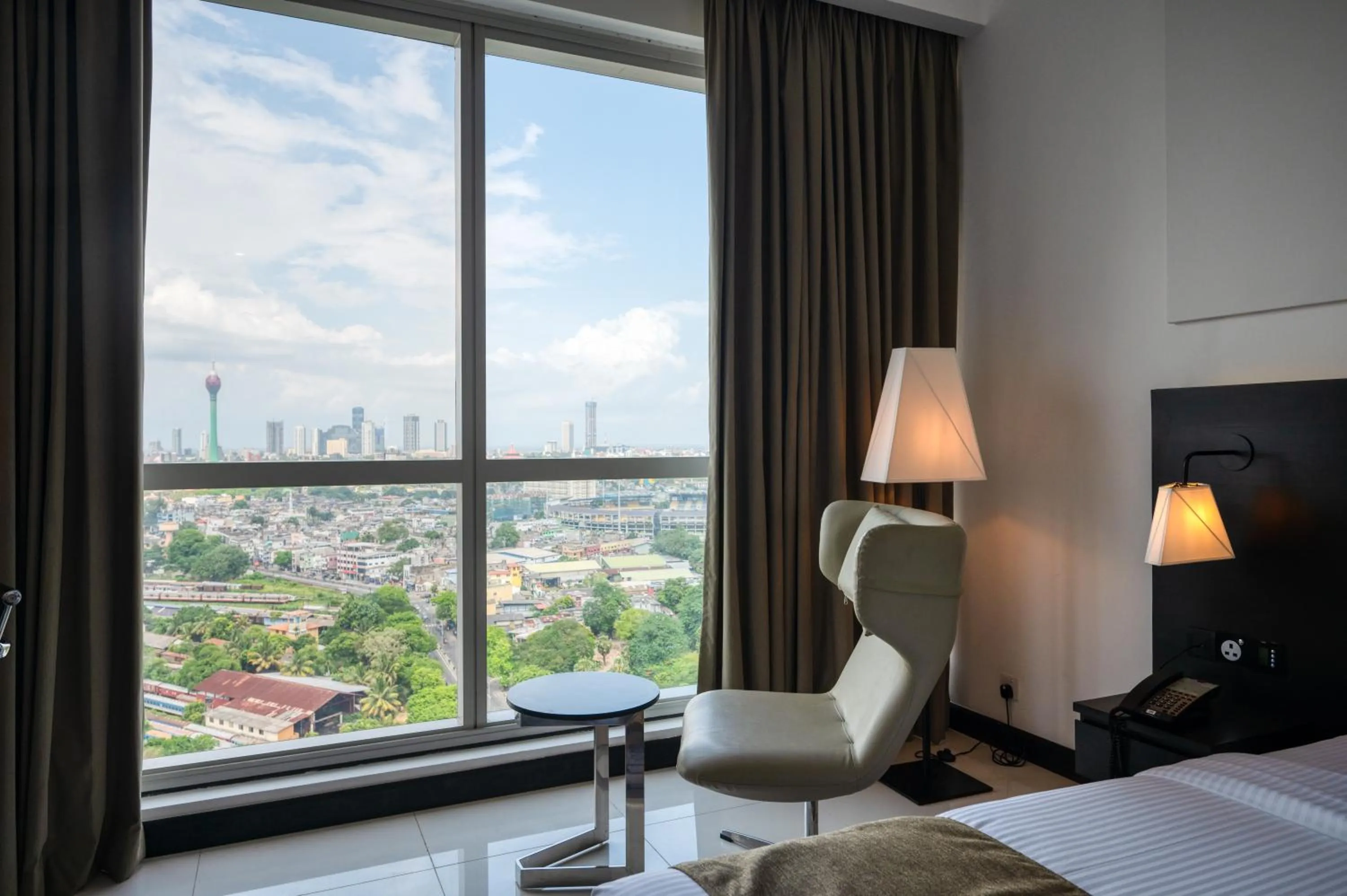 Seating area, Bed in Hatch House for Digital Nomads