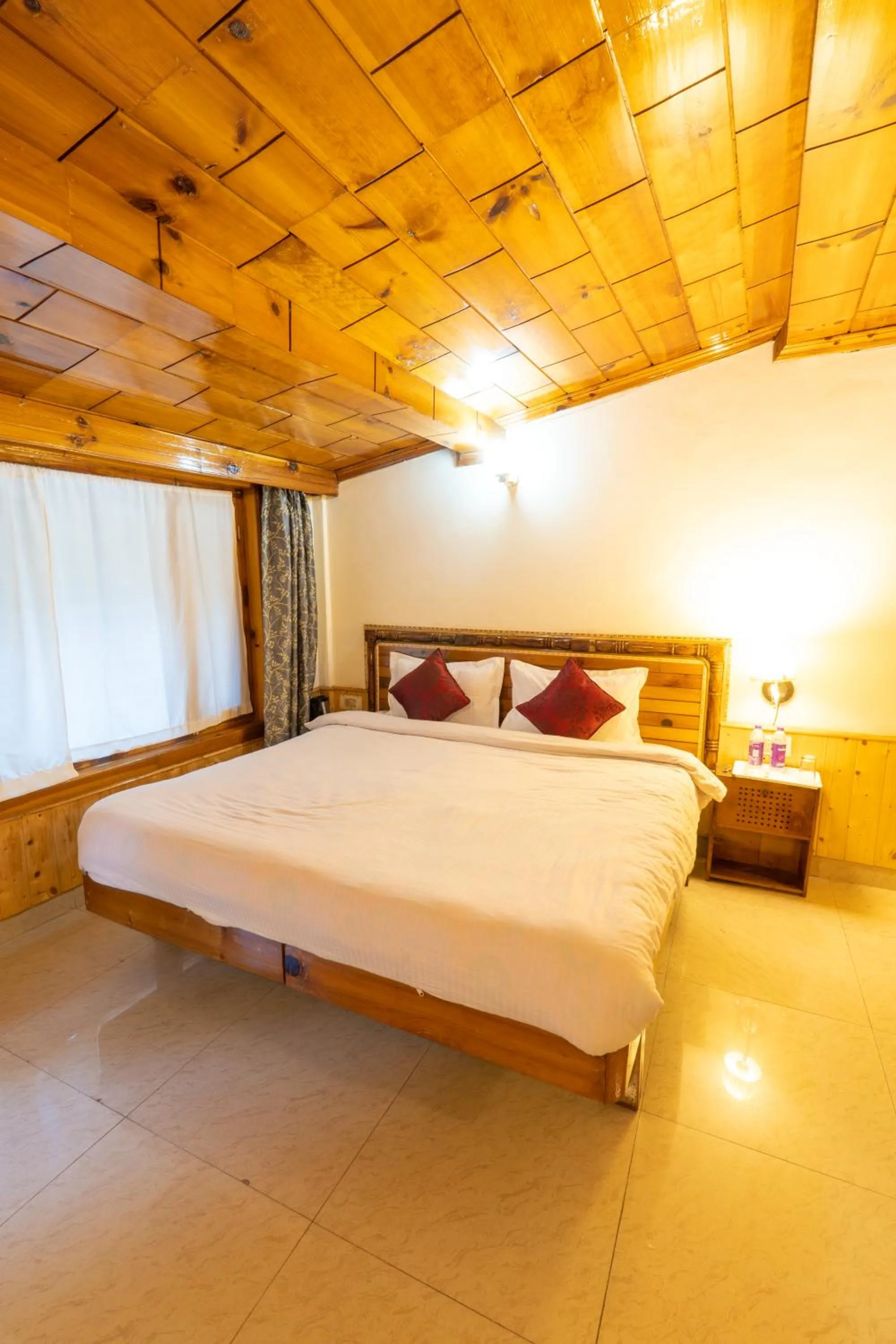 Bed in Holiday Home International -Vivaan Stays