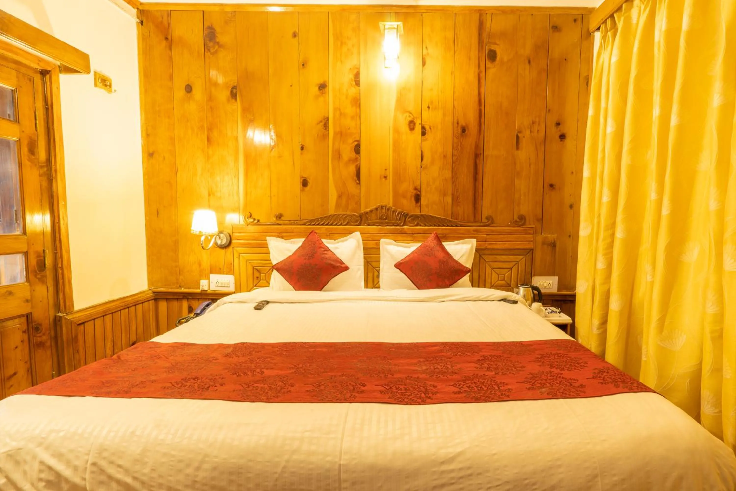 Bed in Holiday Home International -Vivaan Stays