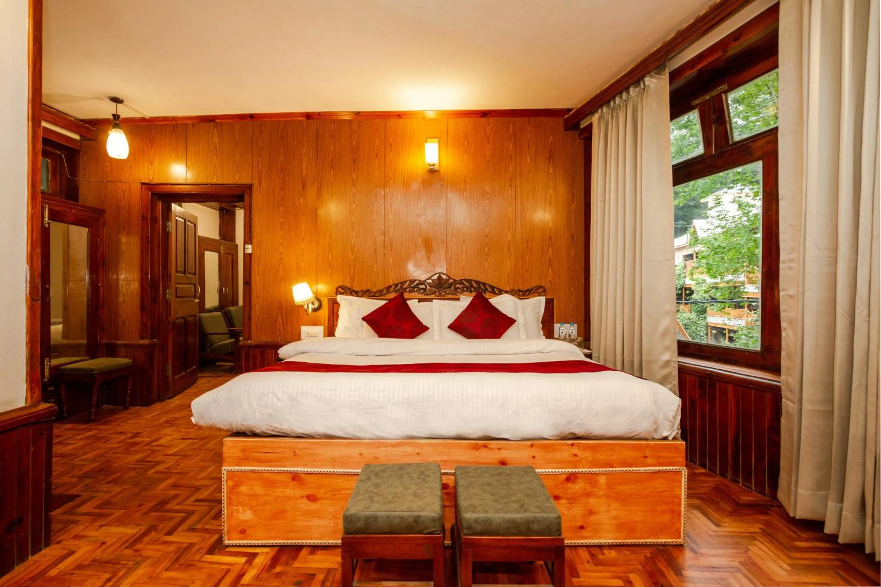 Bed in Holiday Home International -Vivaan Stays