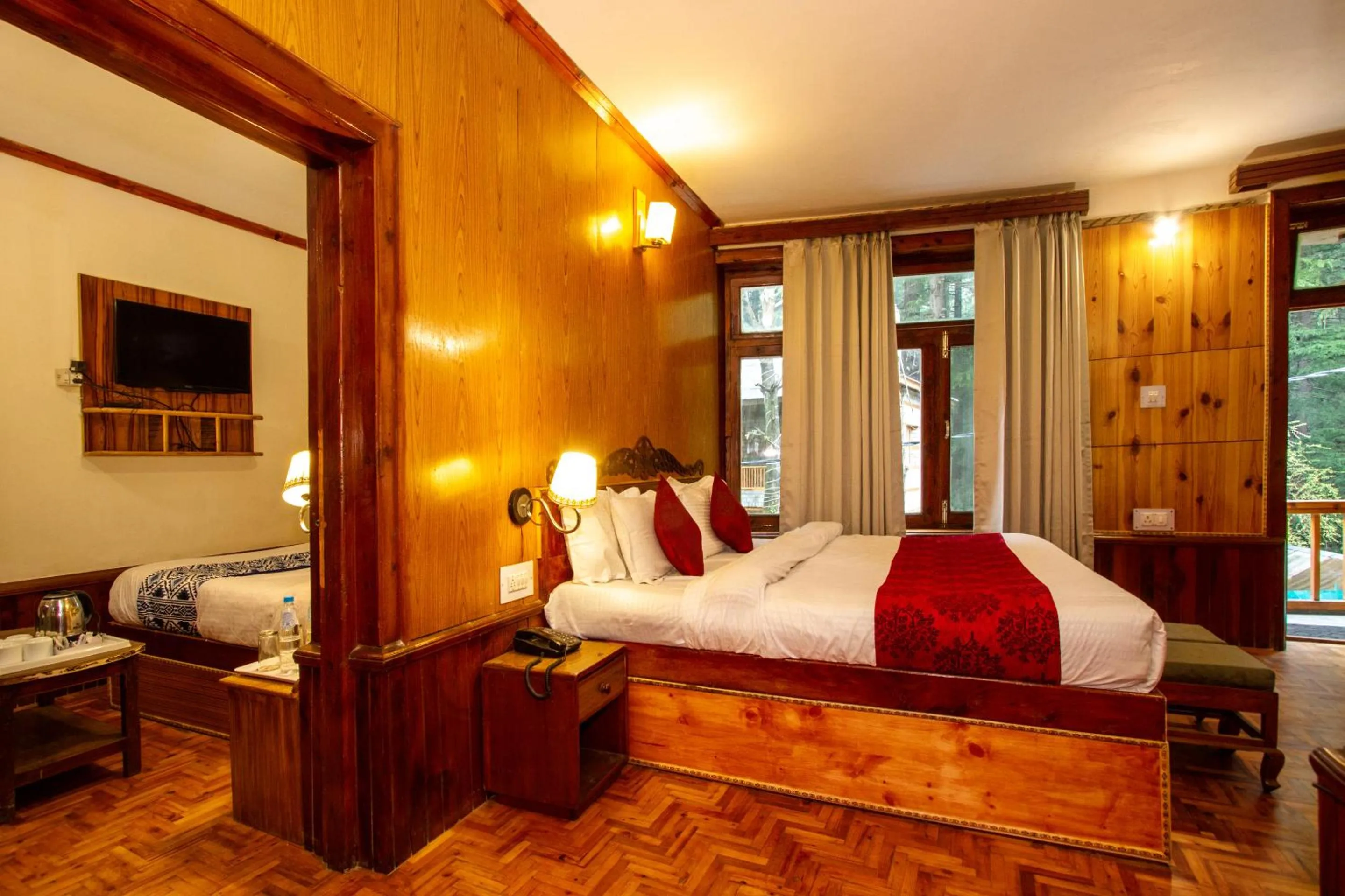 TV and multimedia, Bed in Holiday Home International -Vivaan Stays