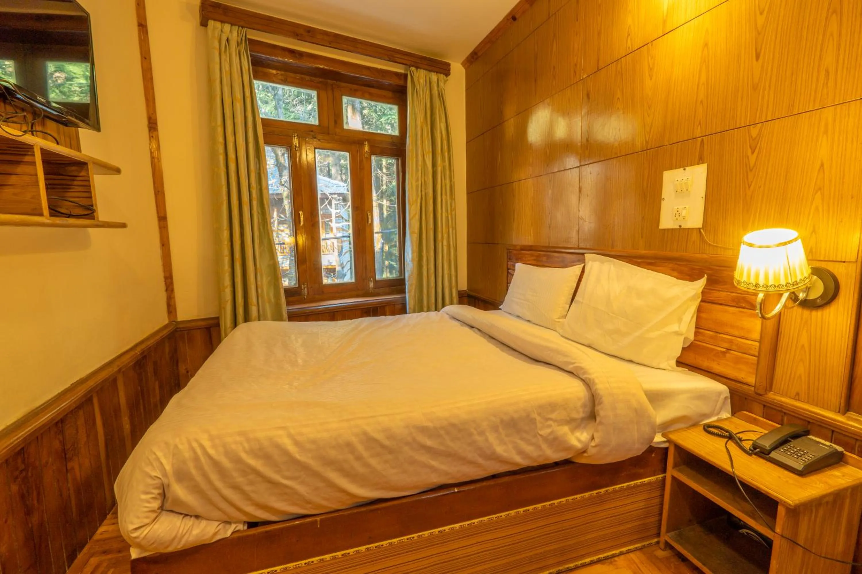 Bed in Holiday Home International -Vivaan Stays