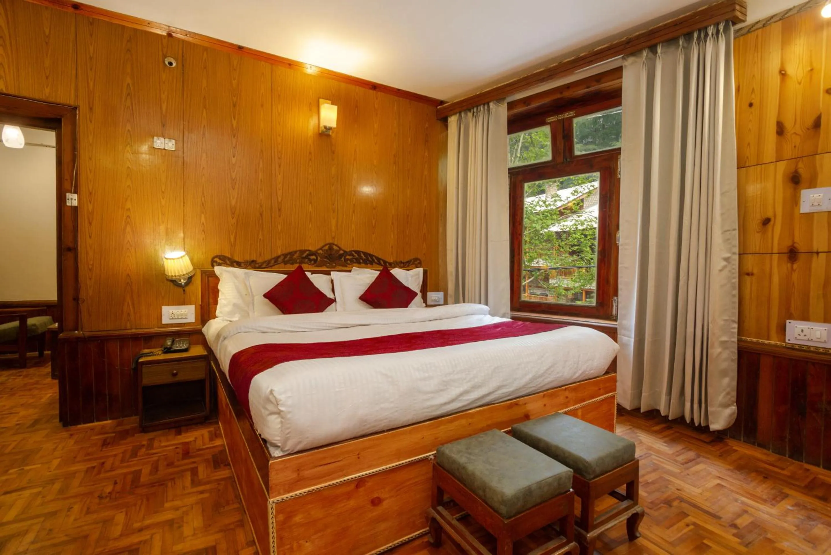 Bed in Holiday Home International -Vivaan Stays