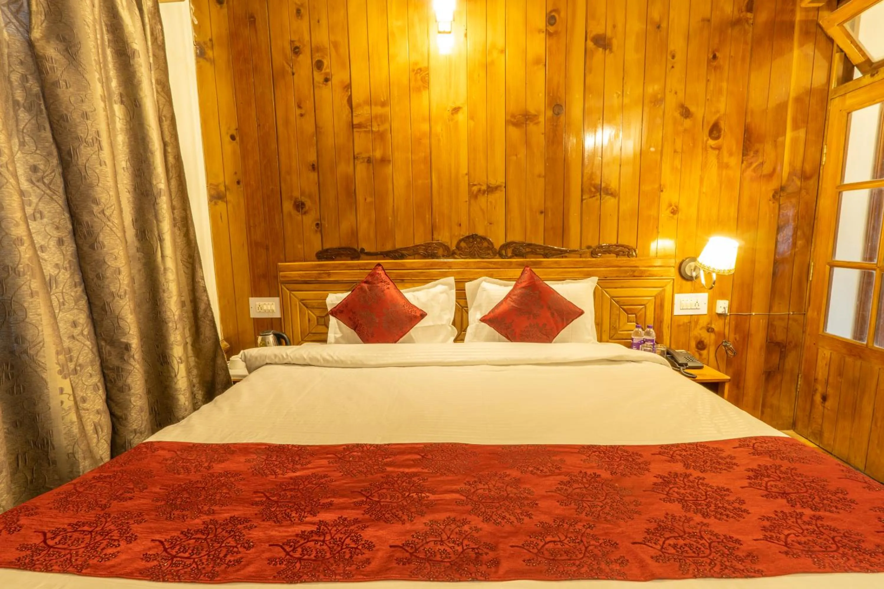 Bedroom, Bed in Holiday Home International -Vivaan Stays