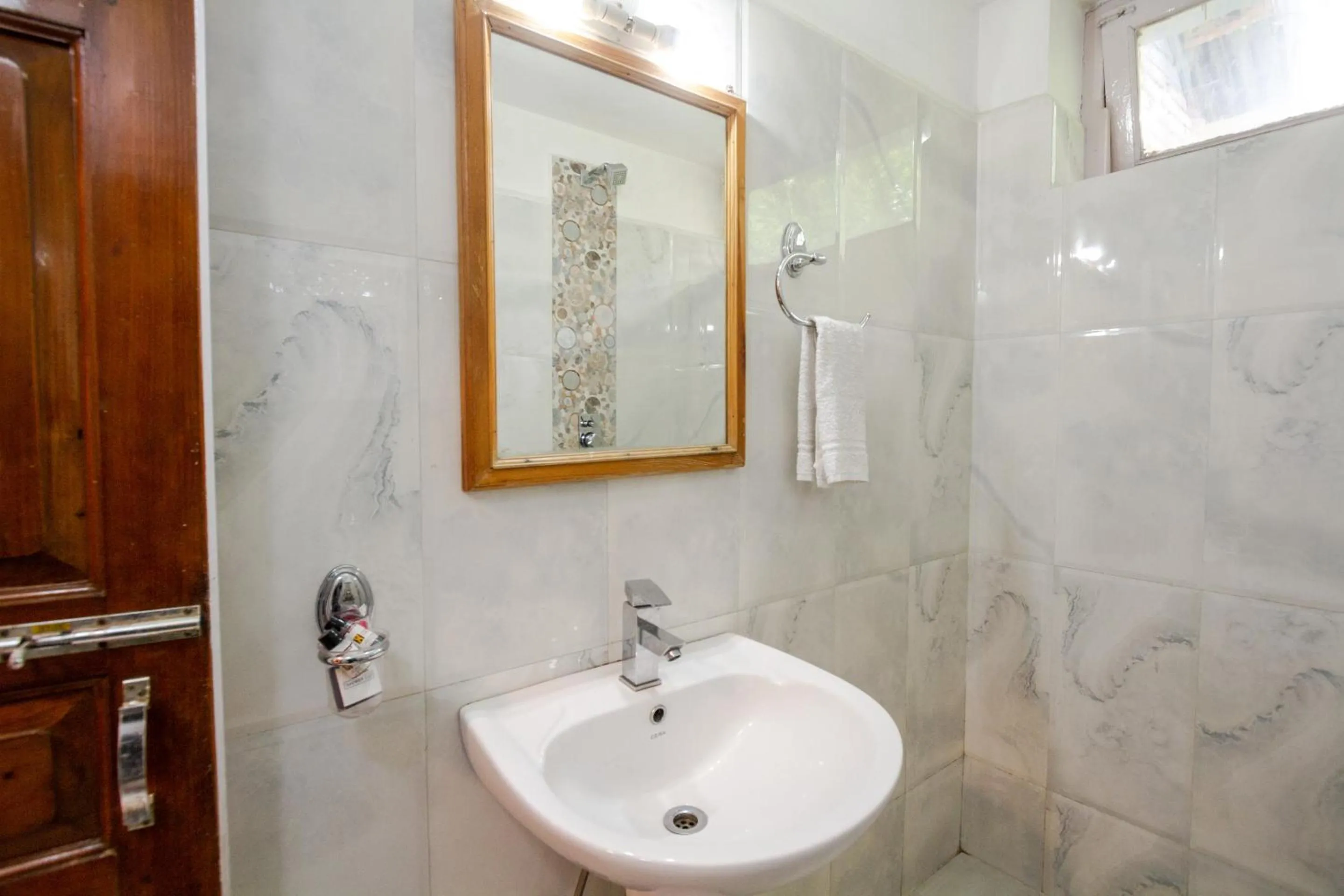 Bathroom in Holiday Home International -Vivaan Stays