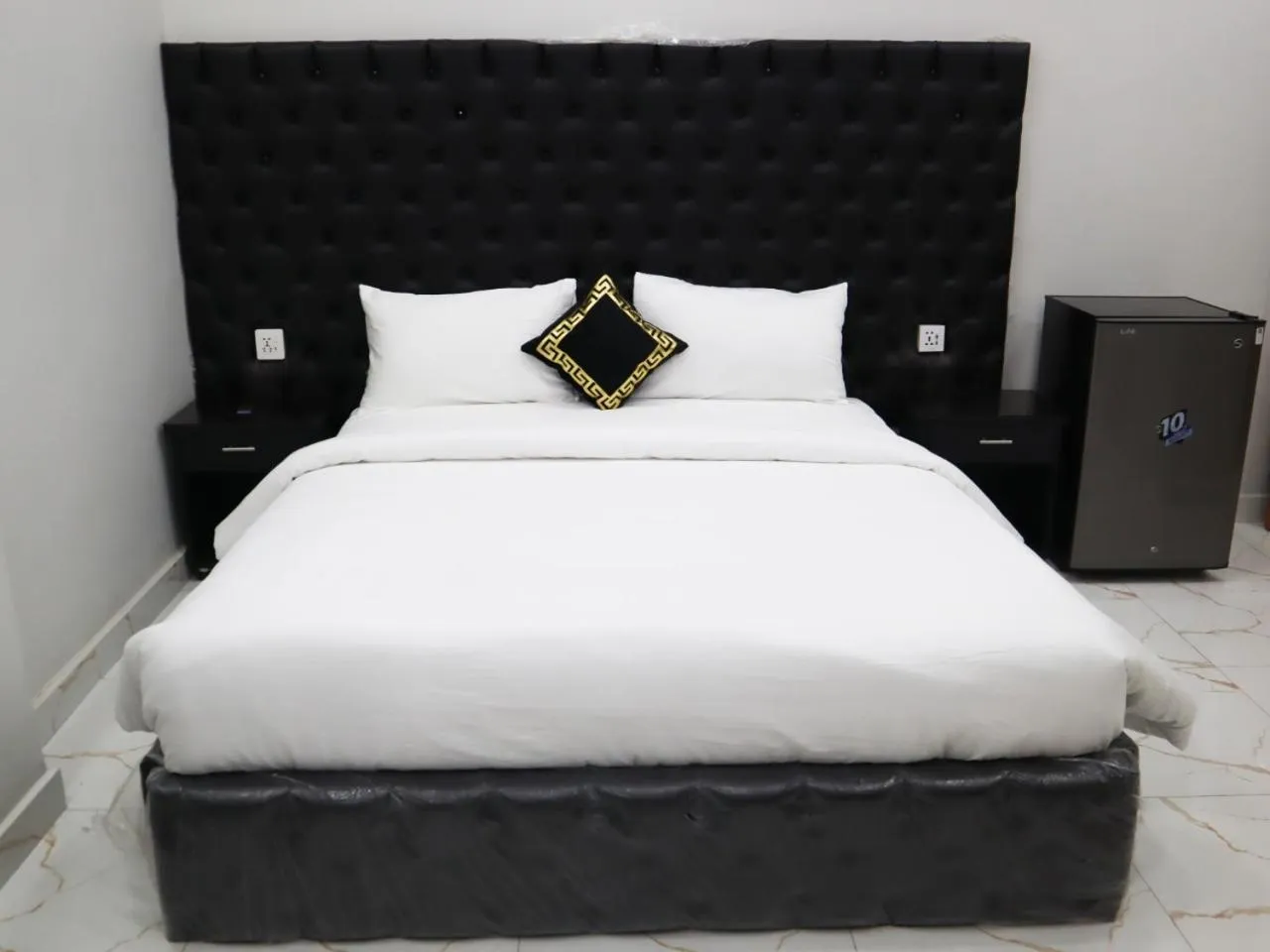 Bed in Hotel Orange One