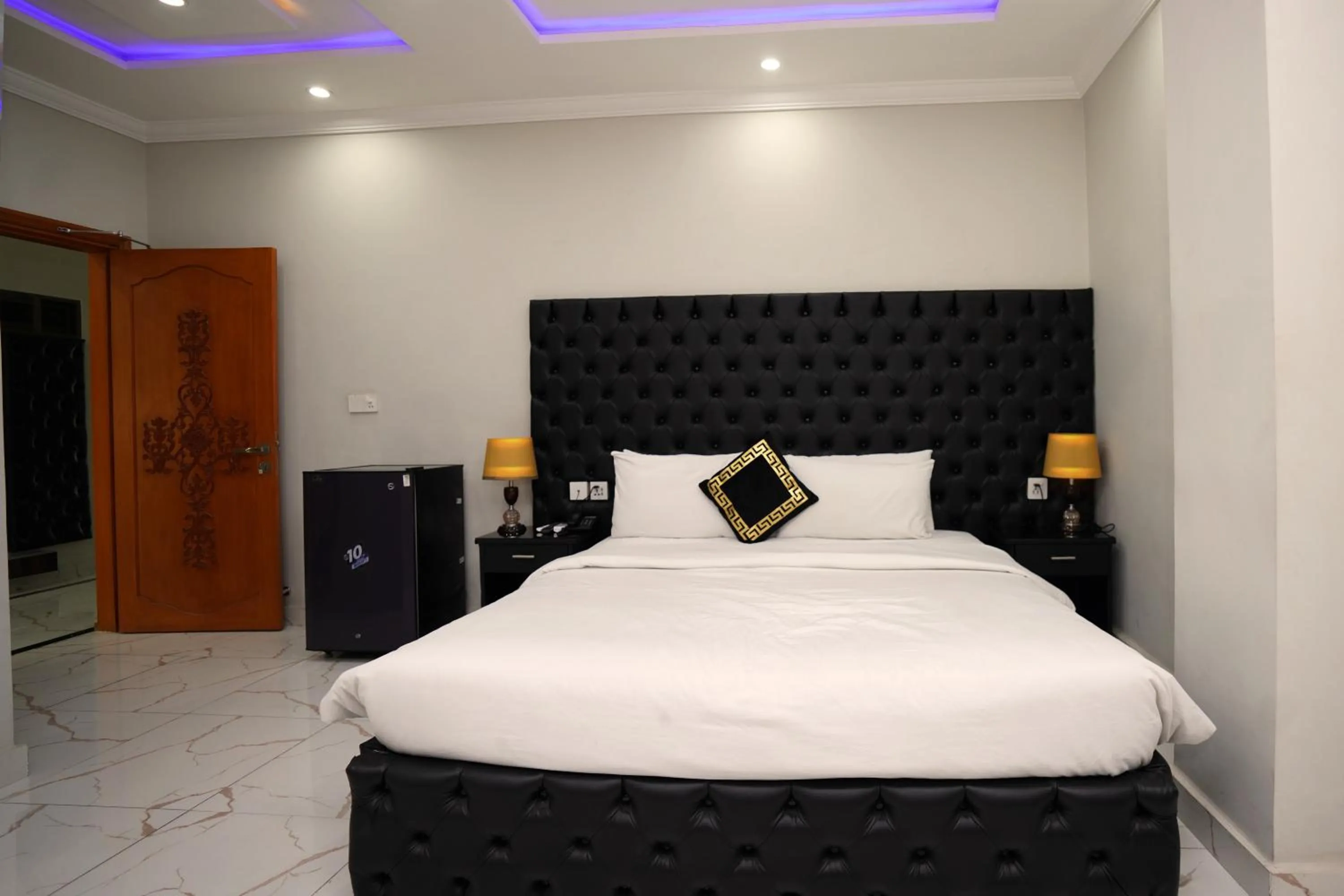 Bed in Hotel Orange One