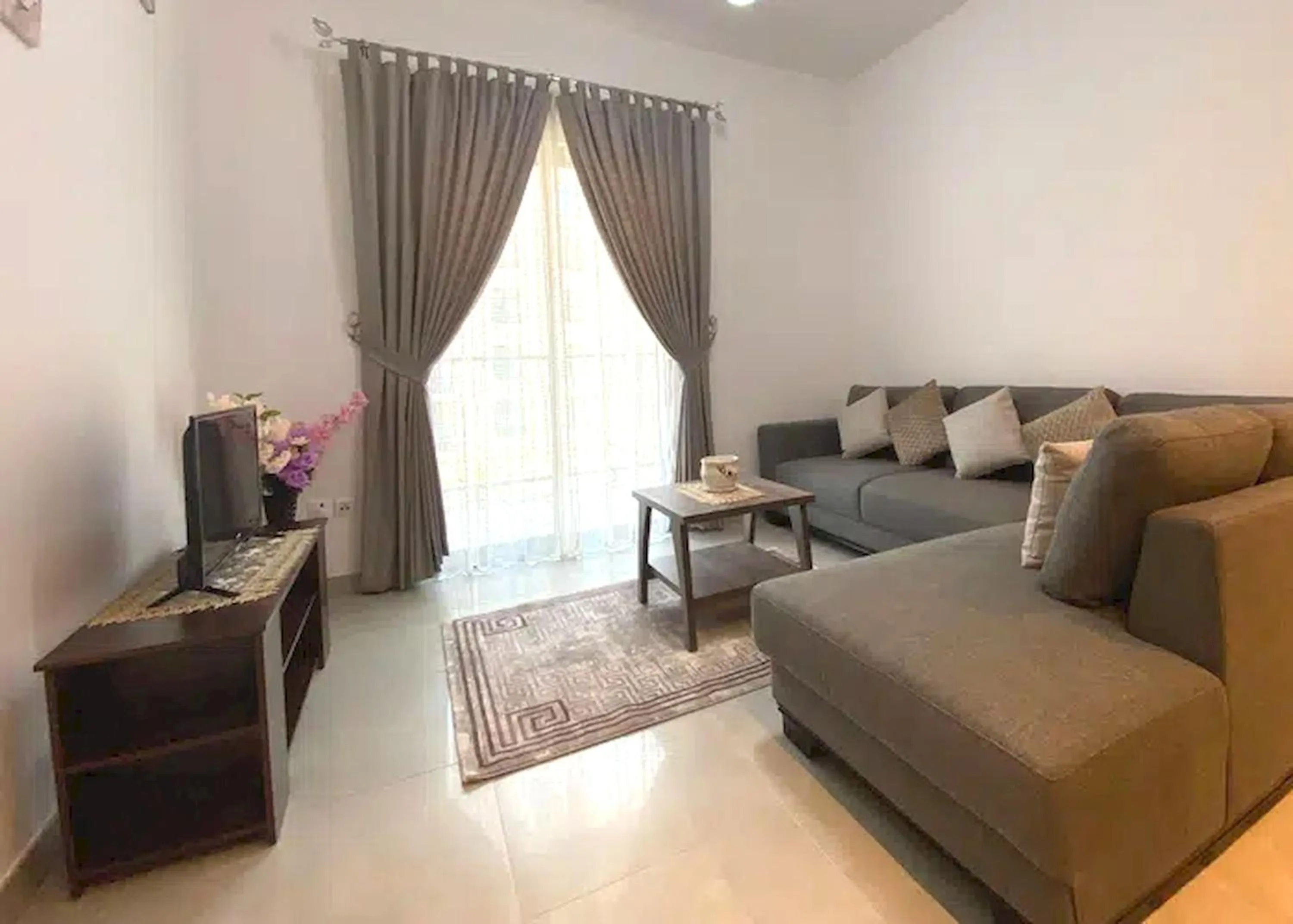 Seating Area in Super OYO 928 Home 436 Binghatti Mirage - 1Br, Jvc