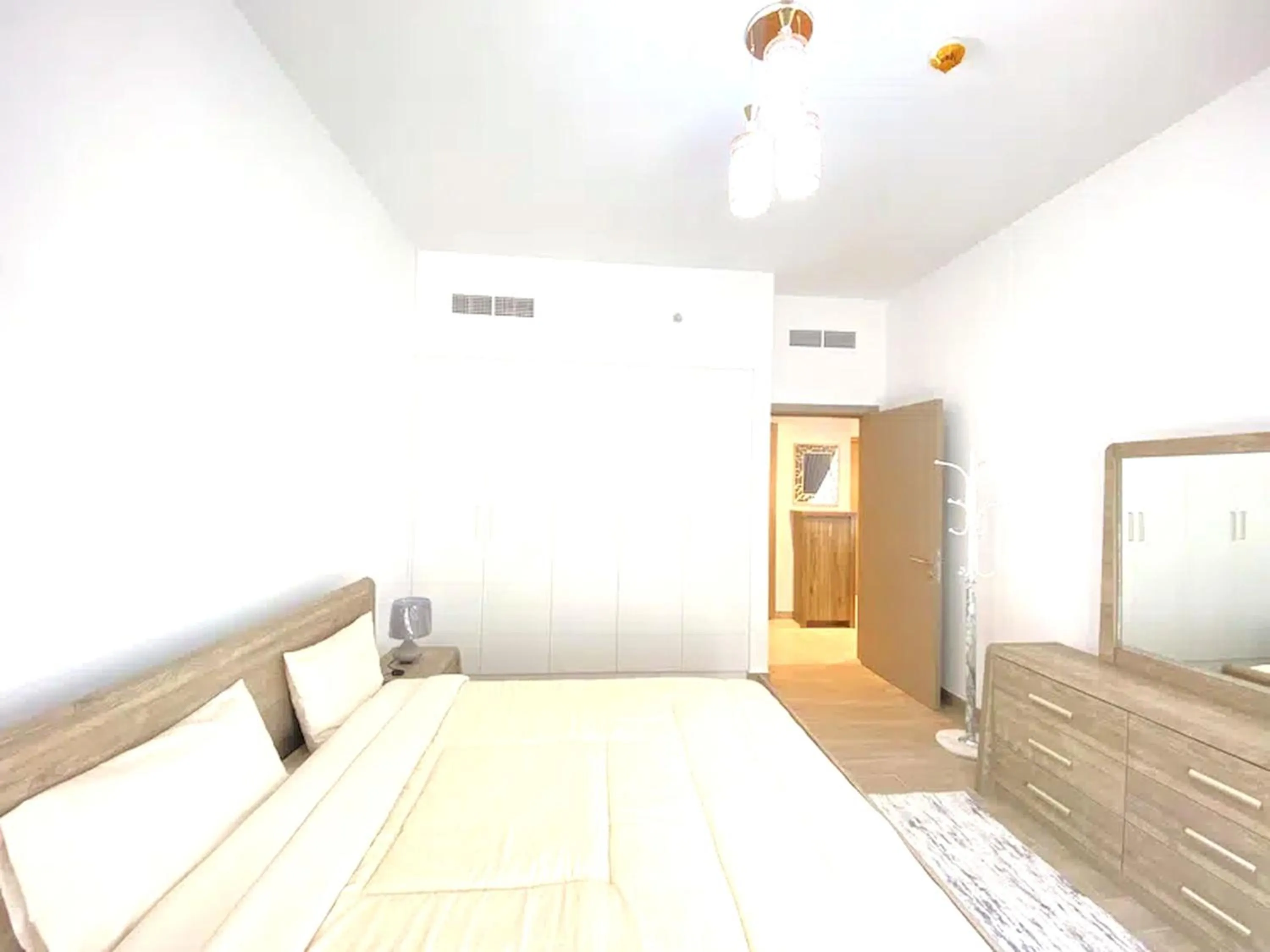 Photo of the whole room in Super OYO 928 Home 436 Binghatti Mirage - 1Br, Jvc