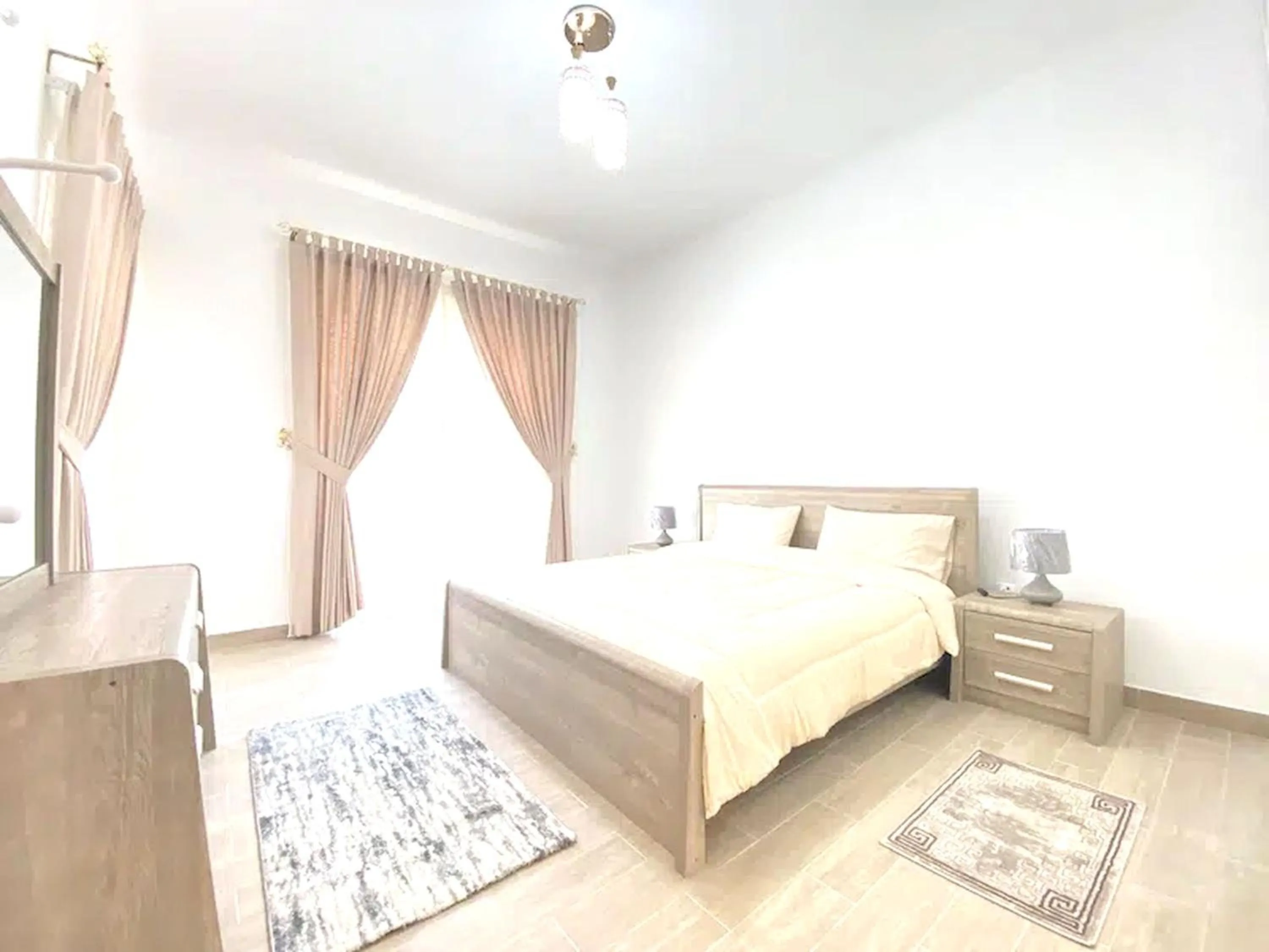 Photo of the whole room in Super OYO 928 Home 436 Binghatti Mirage - 1Br, Jvc