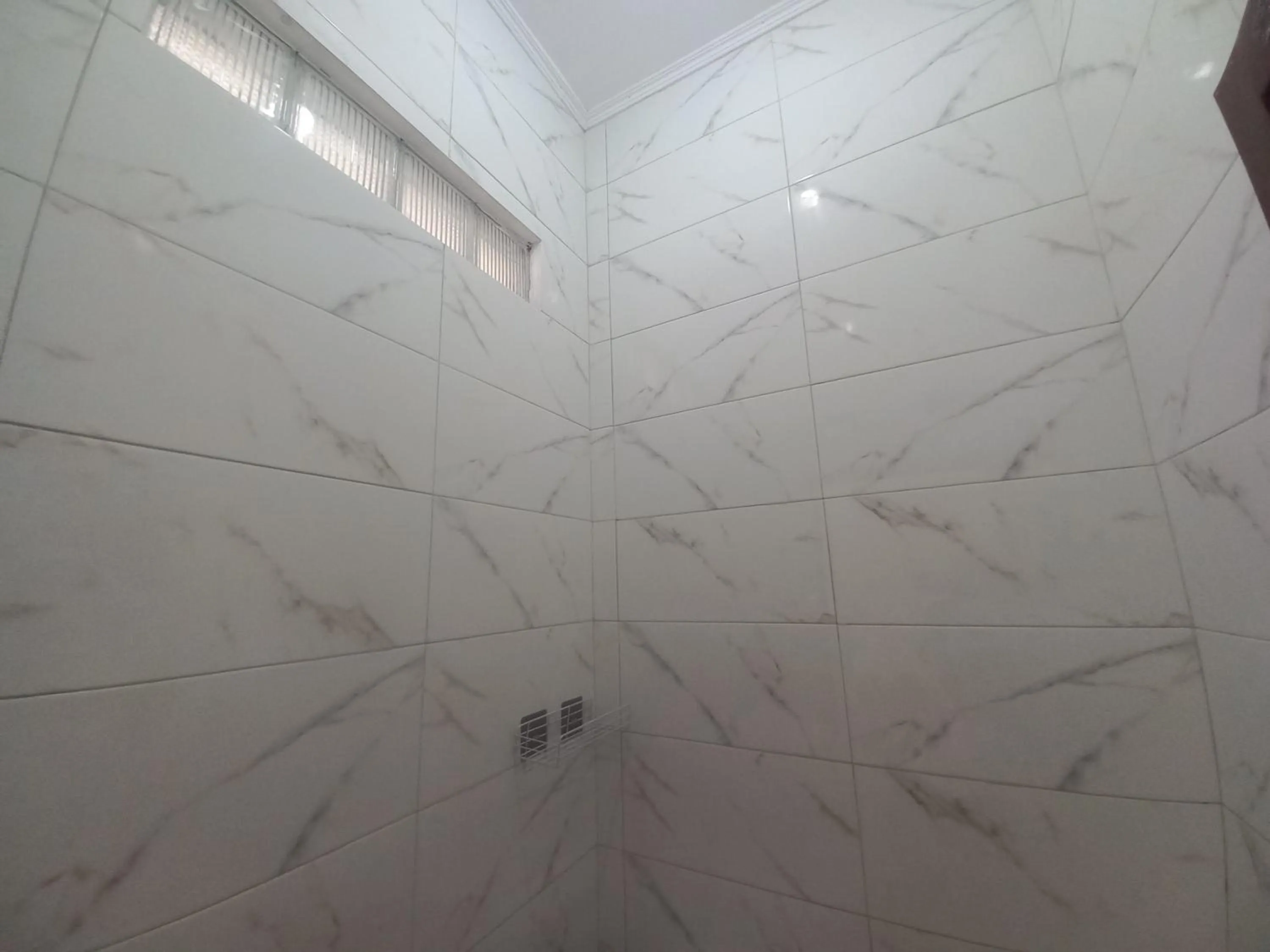 Bathroom in SPOT ON 92415 Bima House Syariah