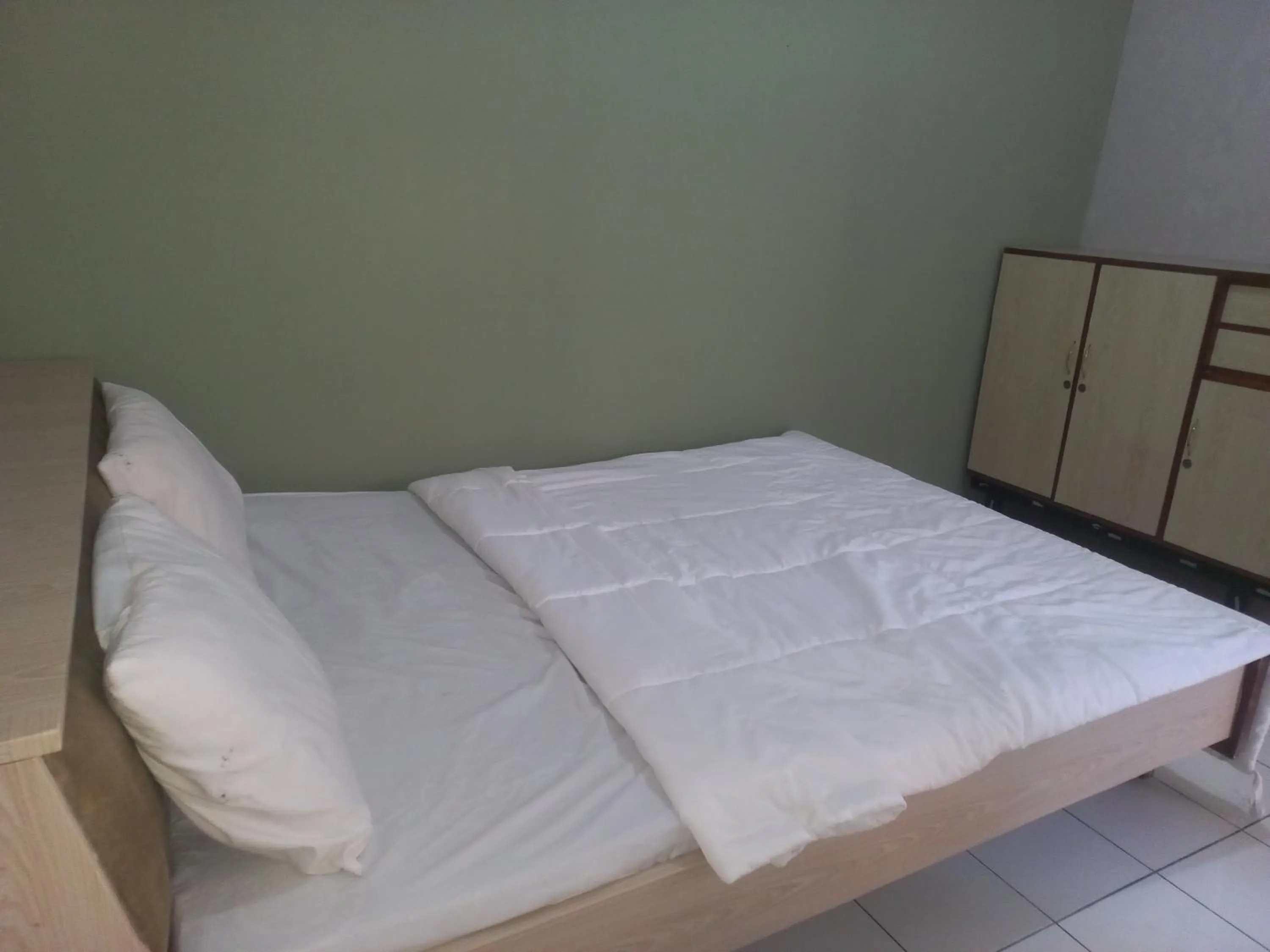 Bedroom in SPOT ON 92415 Bima House Syariah