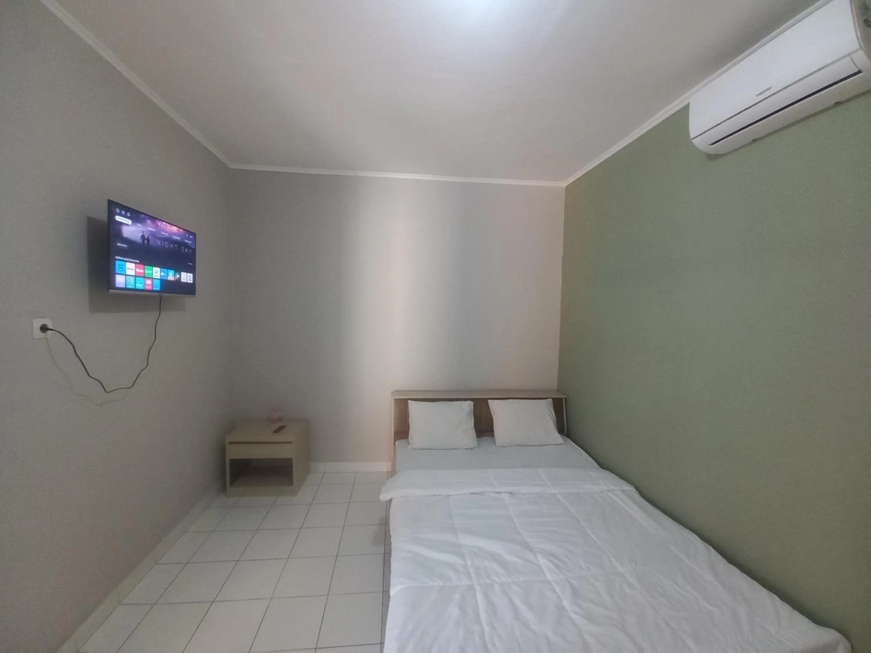 Bedroom in SPOT ON 92415 Bima House Syariah