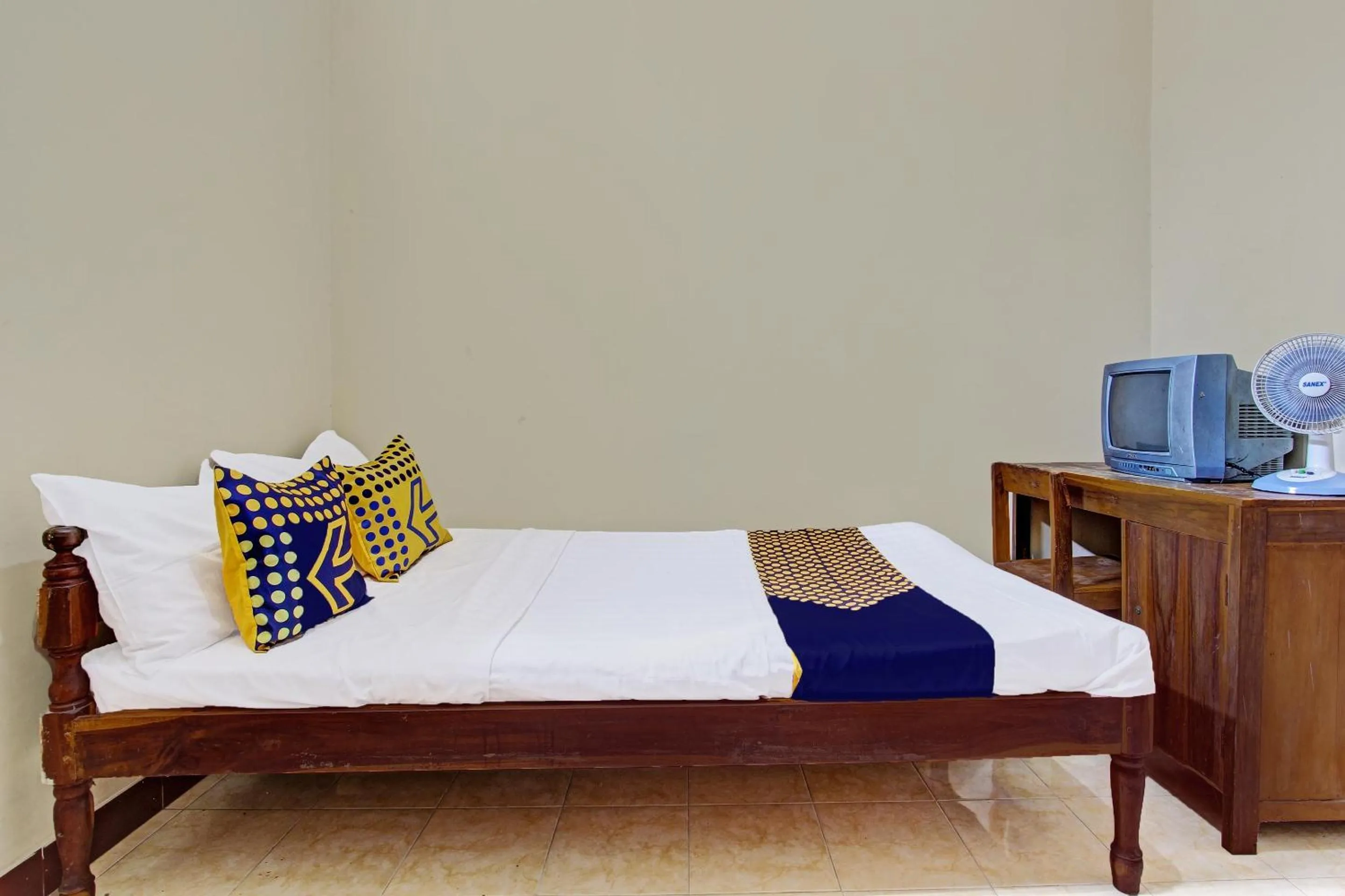 Bedroom in Hotel O Puri Kasih Guest House Syariah