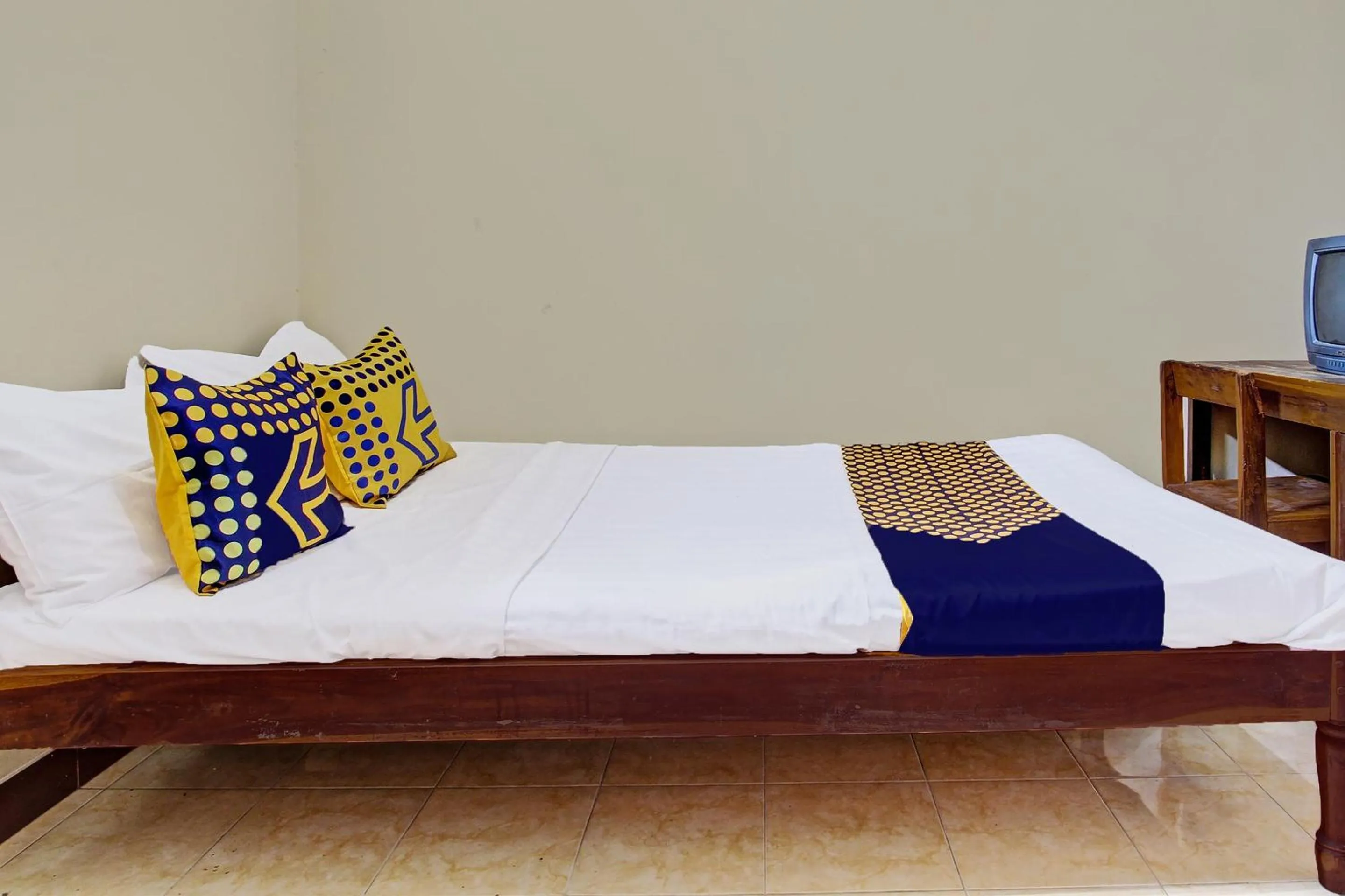 Bedroom in Hotel O Puri Kasih Guest House Syariah