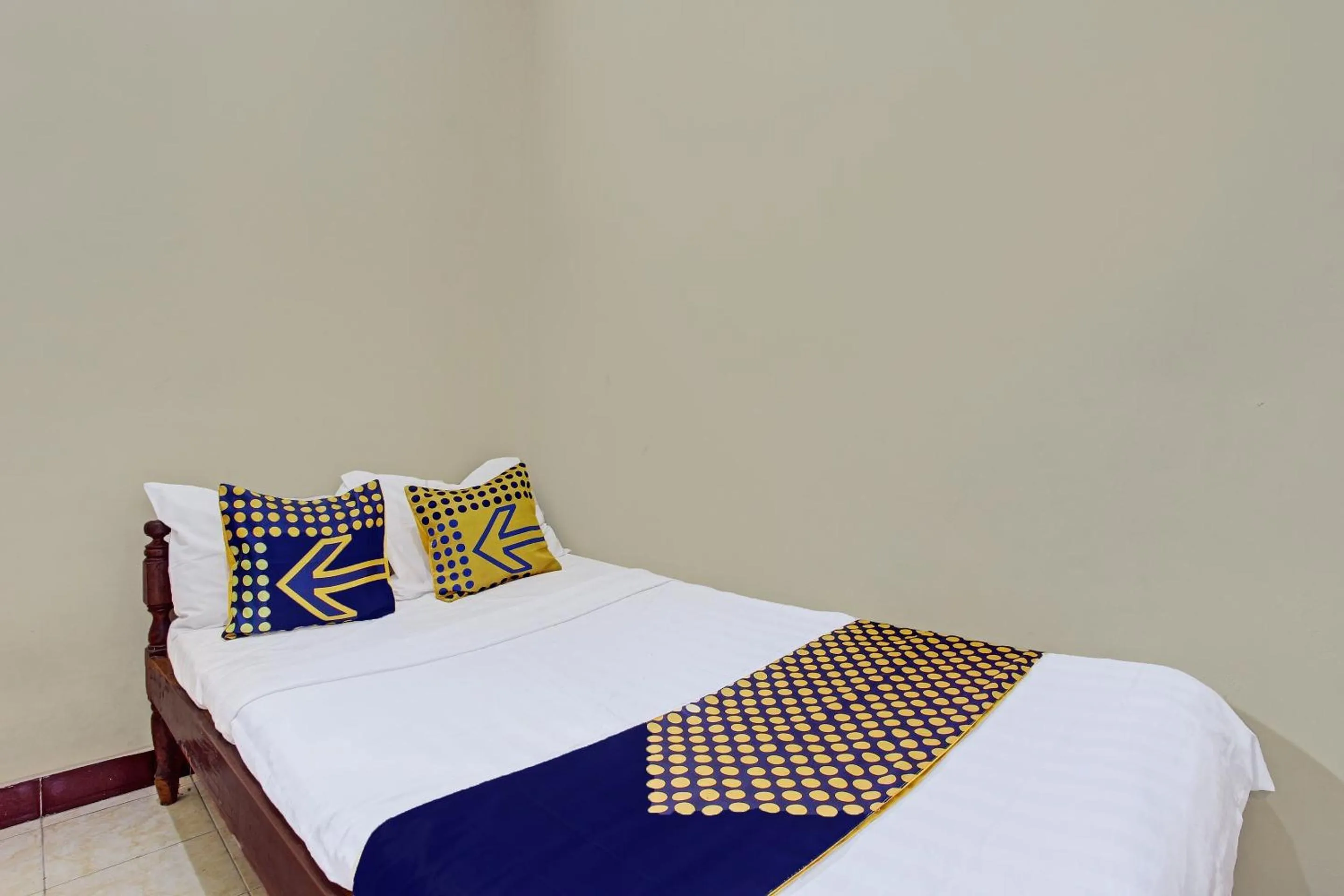 Bedroom in Hotel O Puri Kasih Guest House Syariah