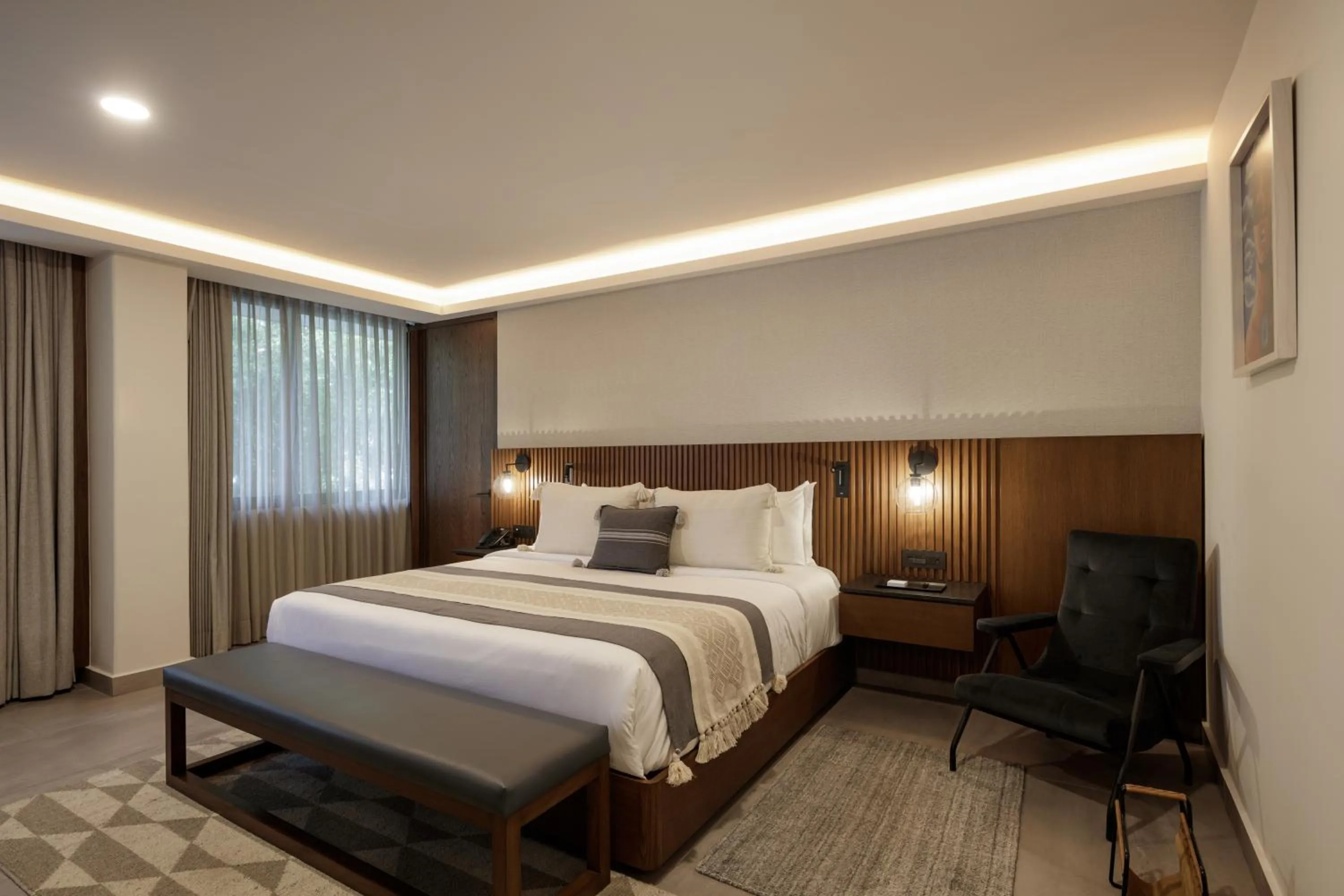 Bed in Origen 438 Luxury Boutique Hotel