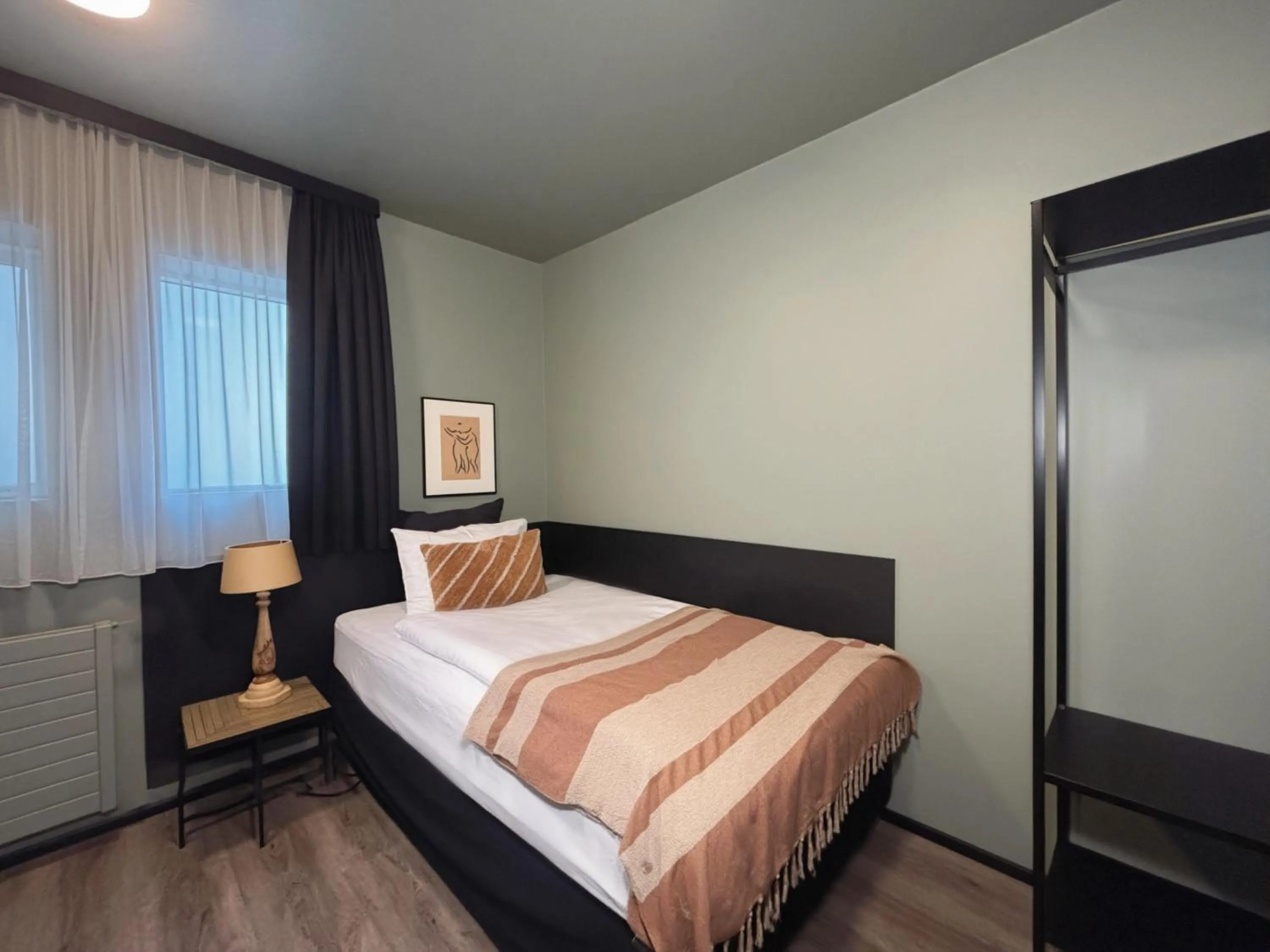 Bed in Hotel Leifur Eiriksson