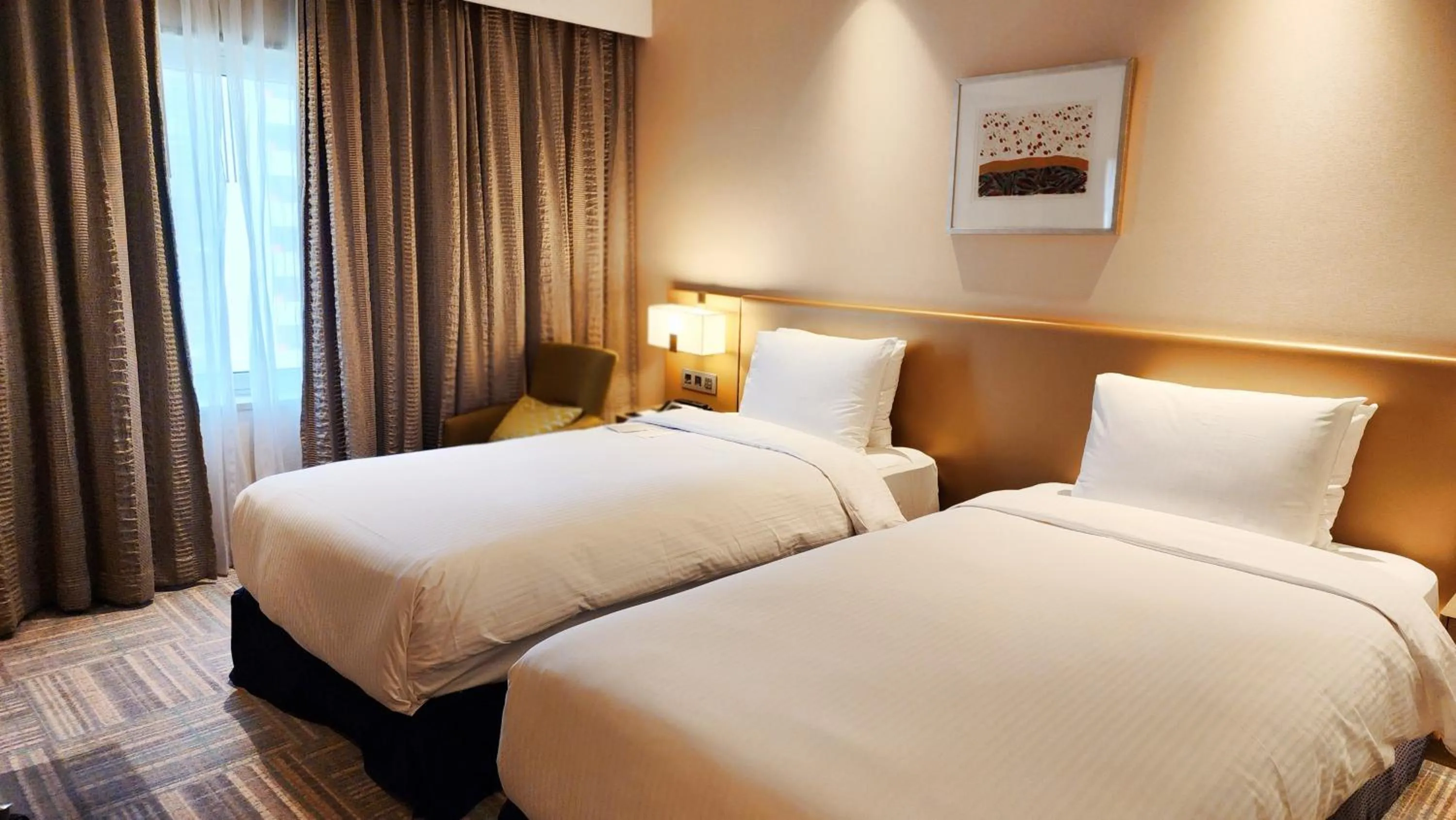 Bed in Novotel Ambassador Seoul Gangnam