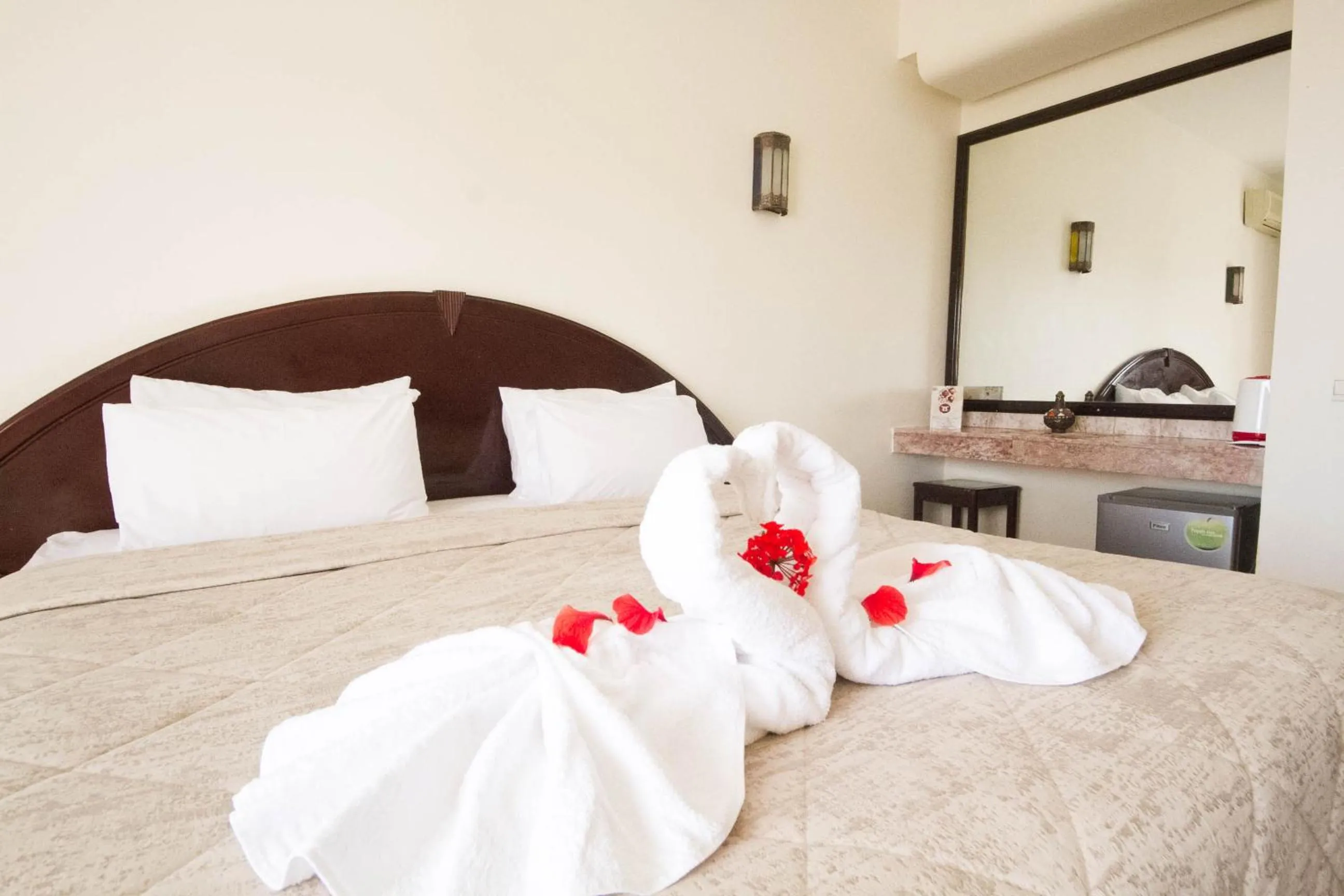 Bed in Intouriste Hôtel & Suites