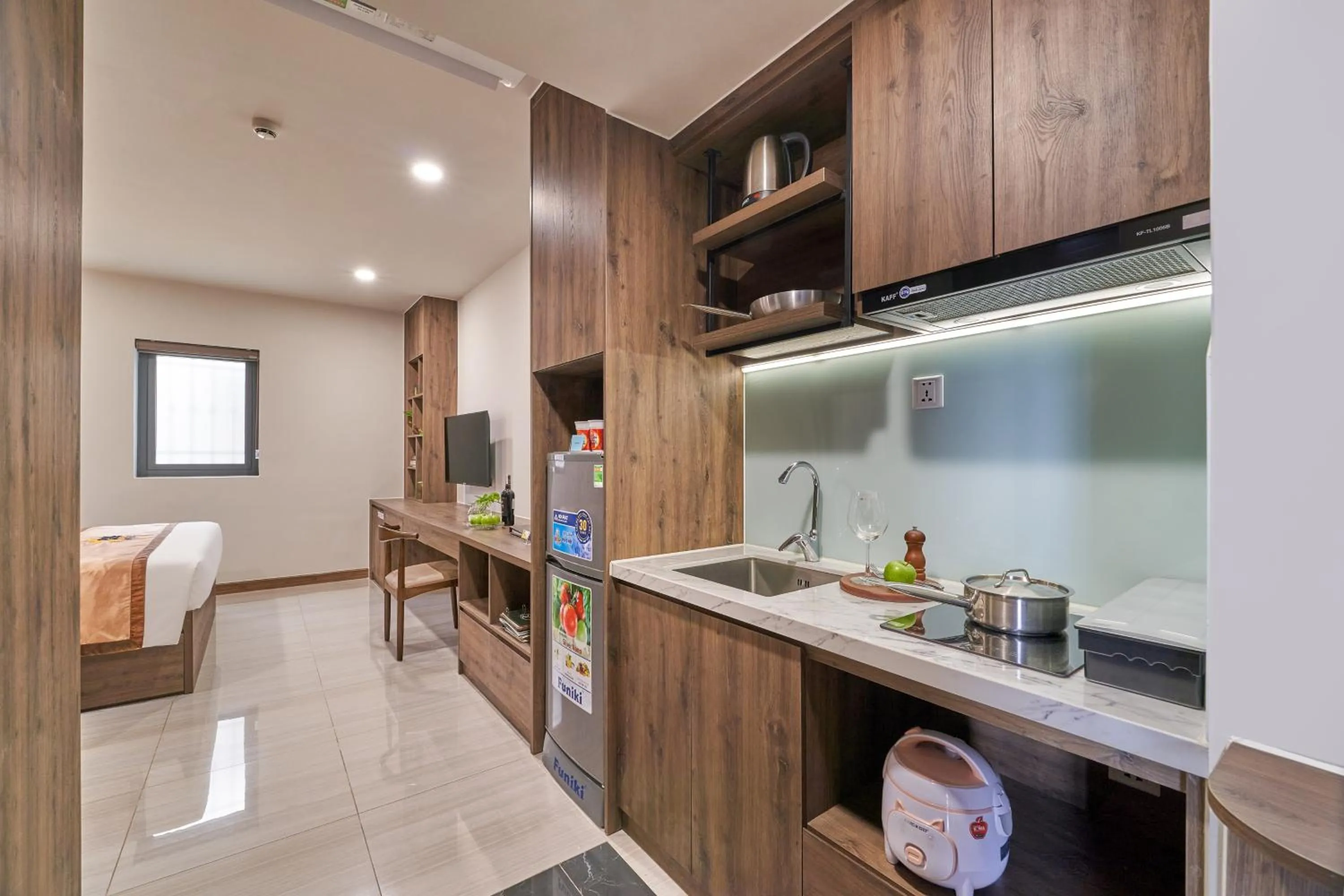 stove in Bcons PS Hotel and Apartment- Newly Opened Hotel