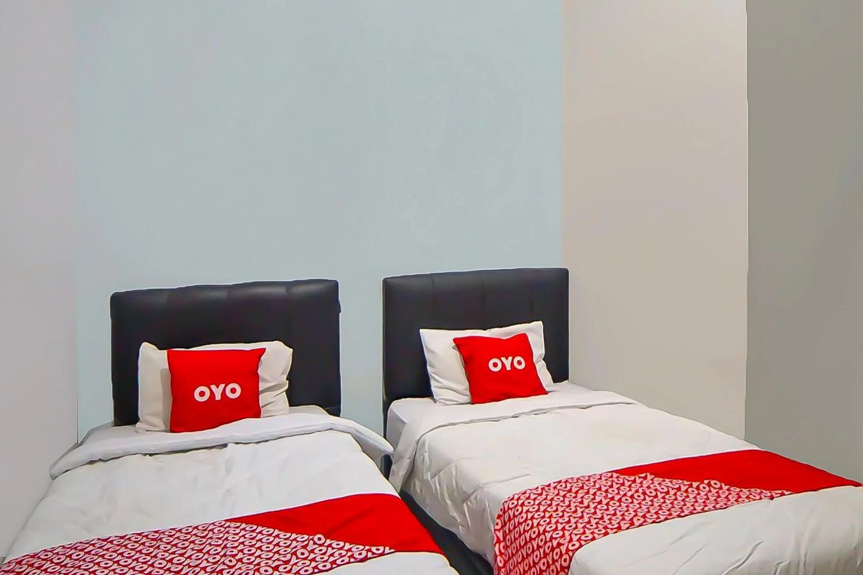 Bedroom in OYO 92463 Deli Hotel Medan