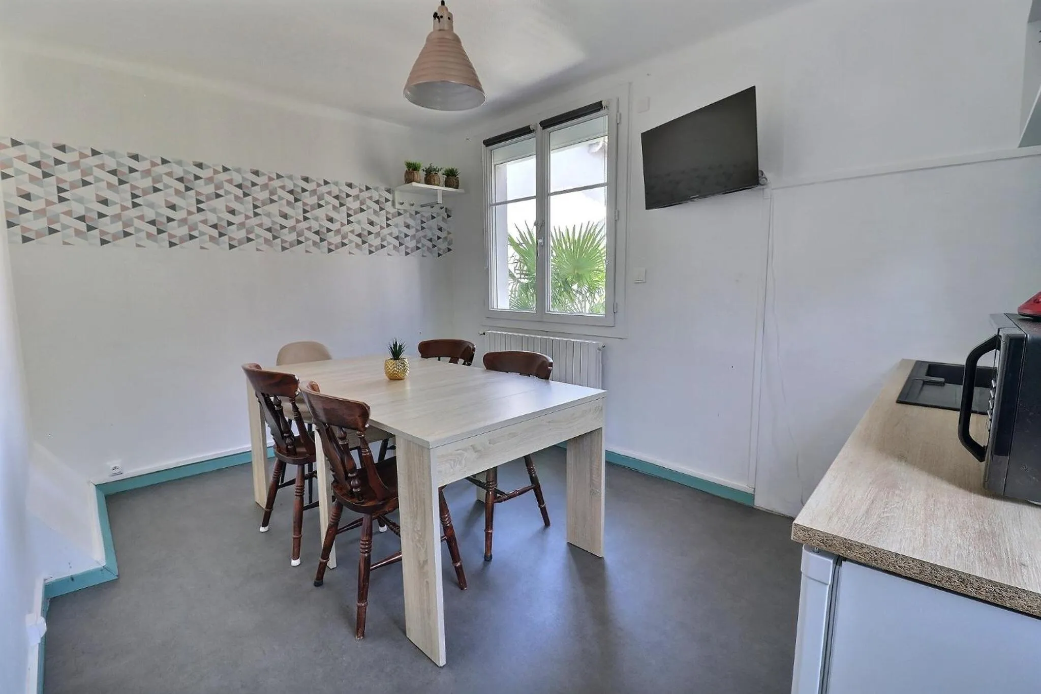 Kitchen or kitchenette in Hôtel Le Smile