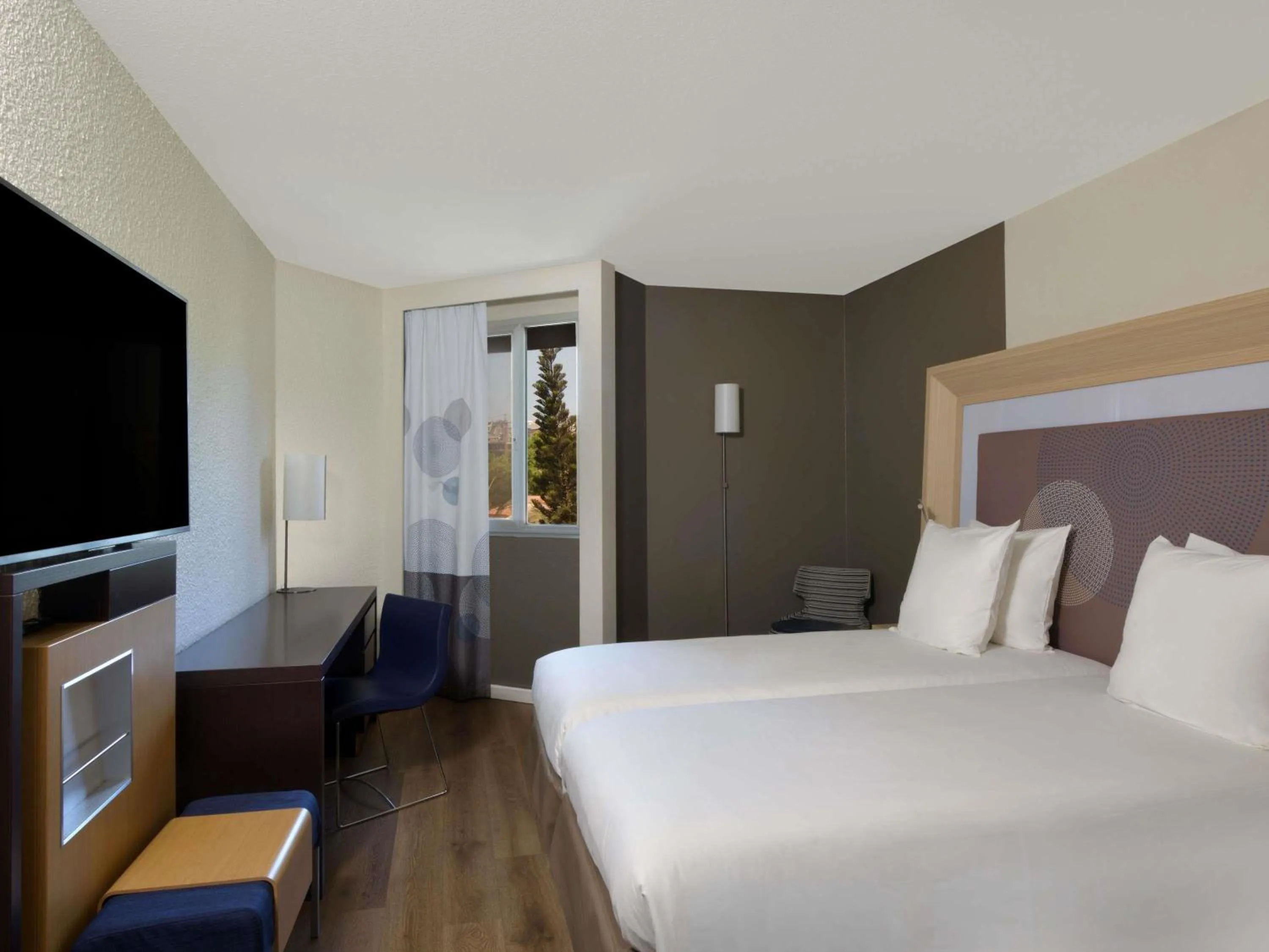 Bedroom, Bed in Novotel Dakar