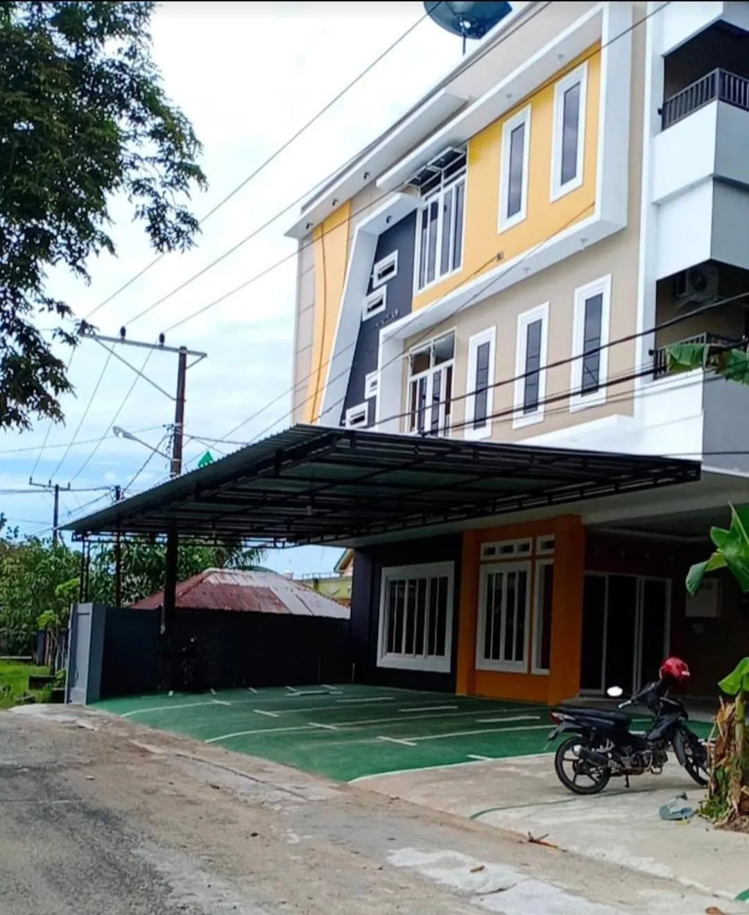 Facade/entrance in Hotel O Tri Homestay
