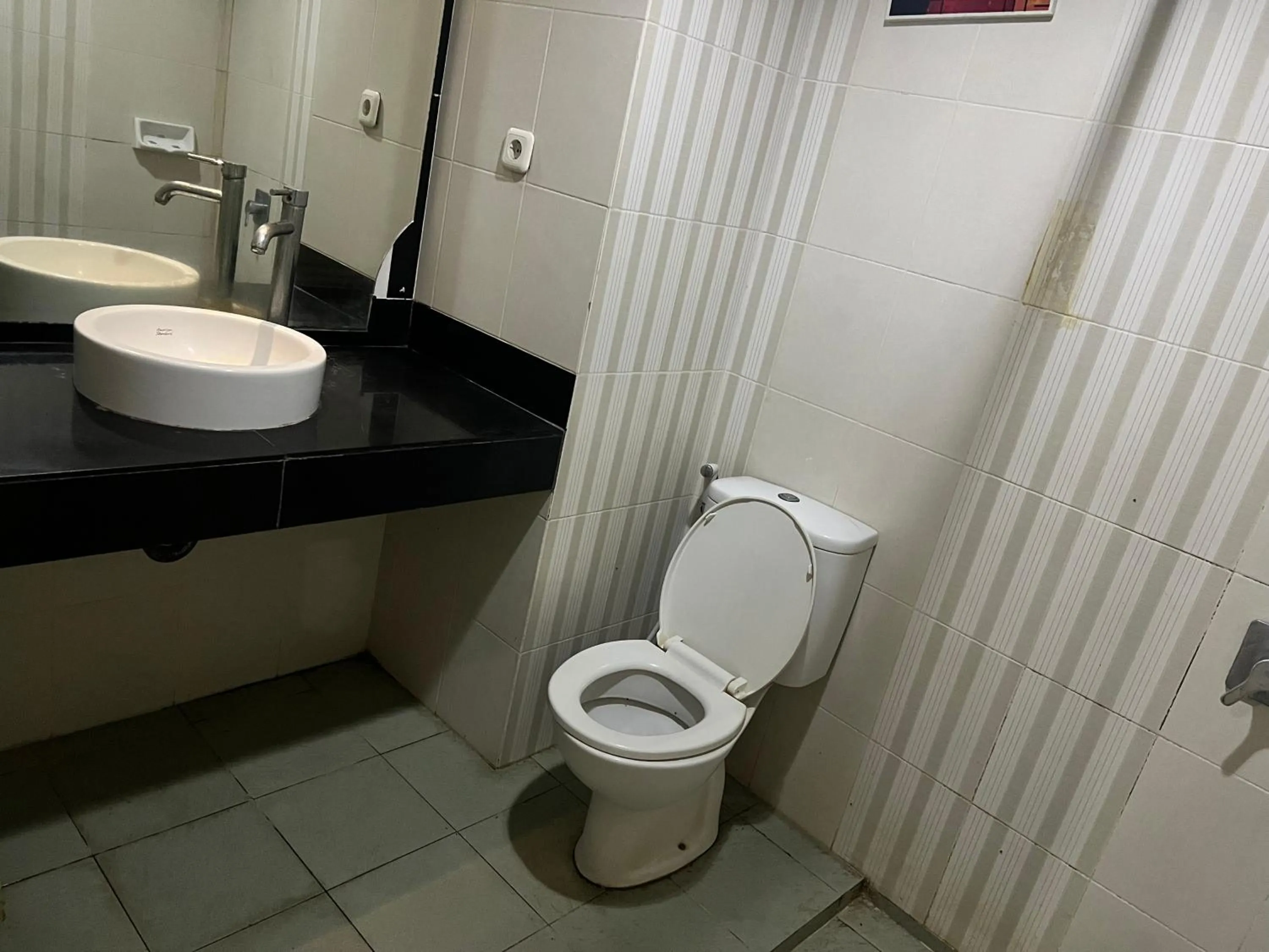 Bedroom in Hotel O Tri Homestay