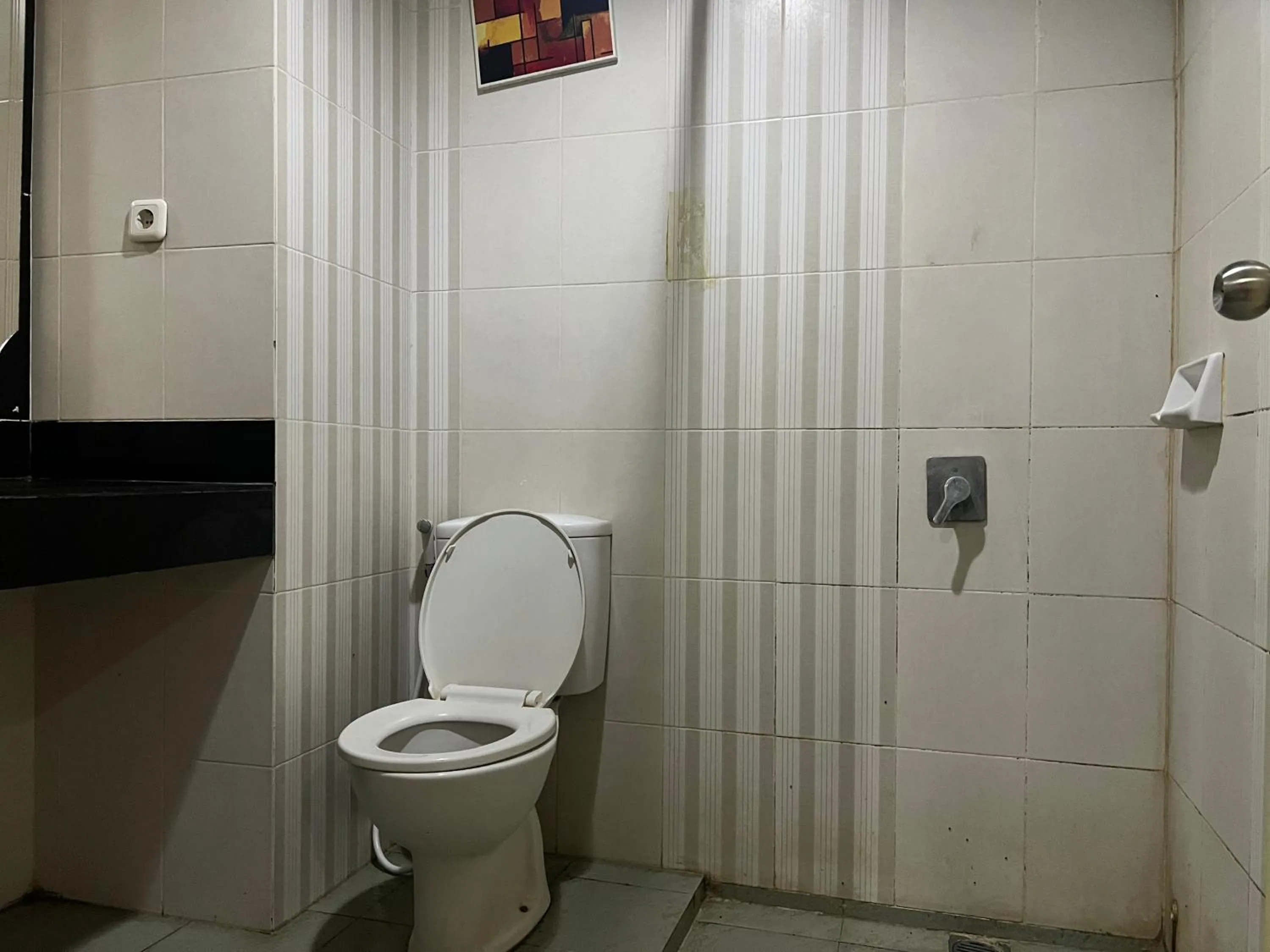 Bedroom in Hotel O Tri Homestay