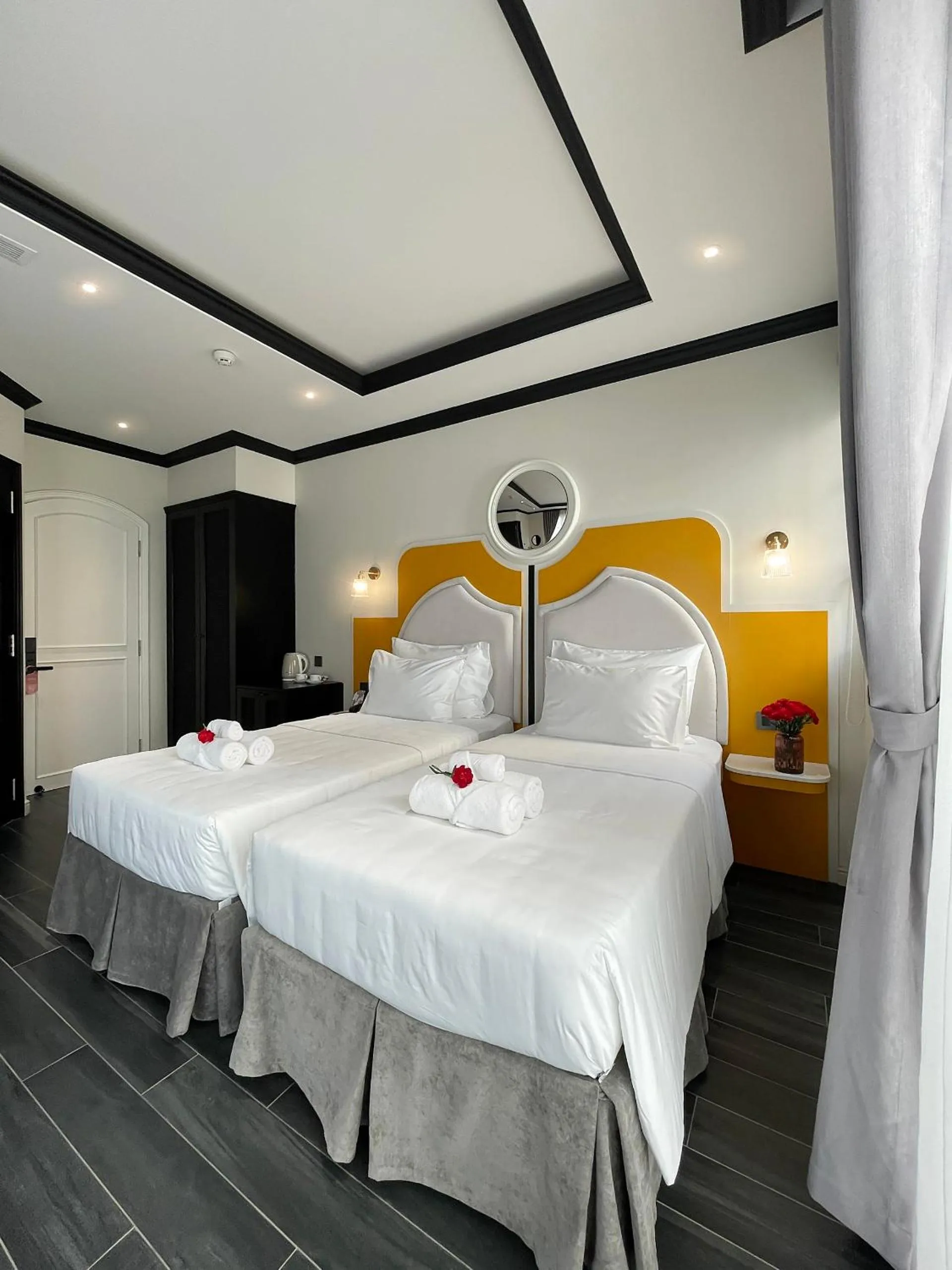 Bed in Le Bonheur Hotel