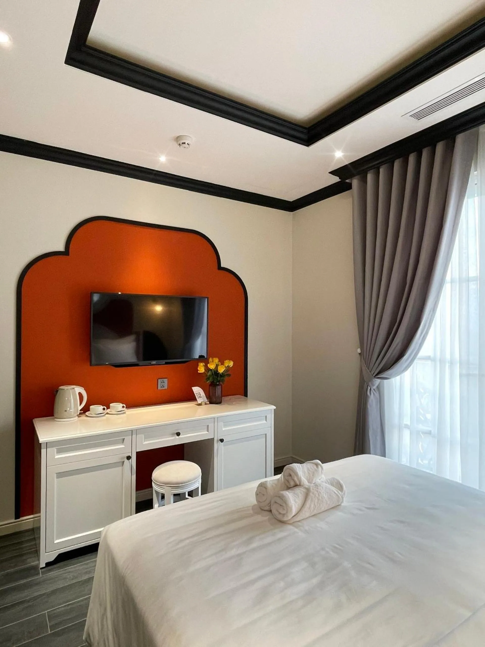 Bed in Le Bonheur Hotel