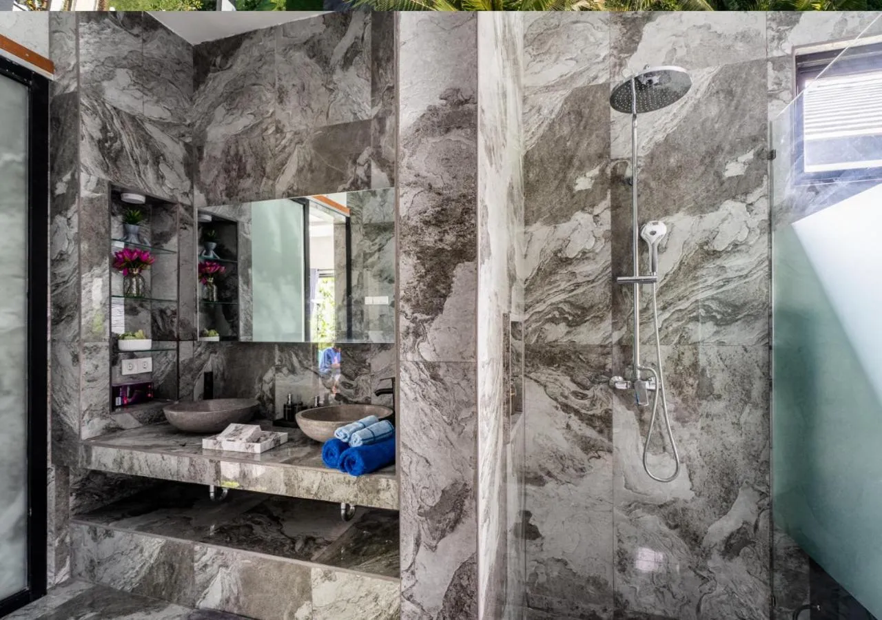 Shower in Capung Asri Eco Luxury Resort with Private Pool Villas