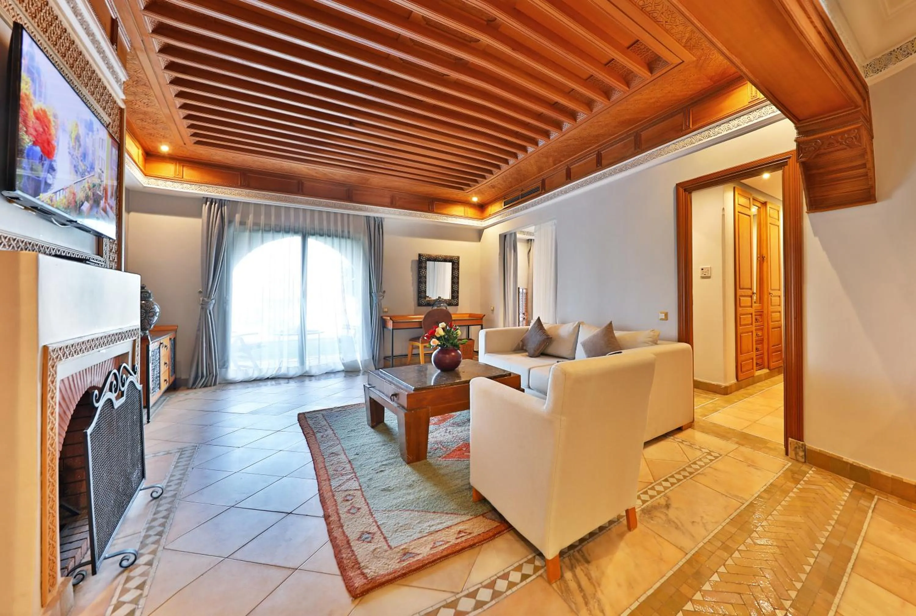 Communal lounge/ TV room in Pavillon du Golf - Palmeraie suites