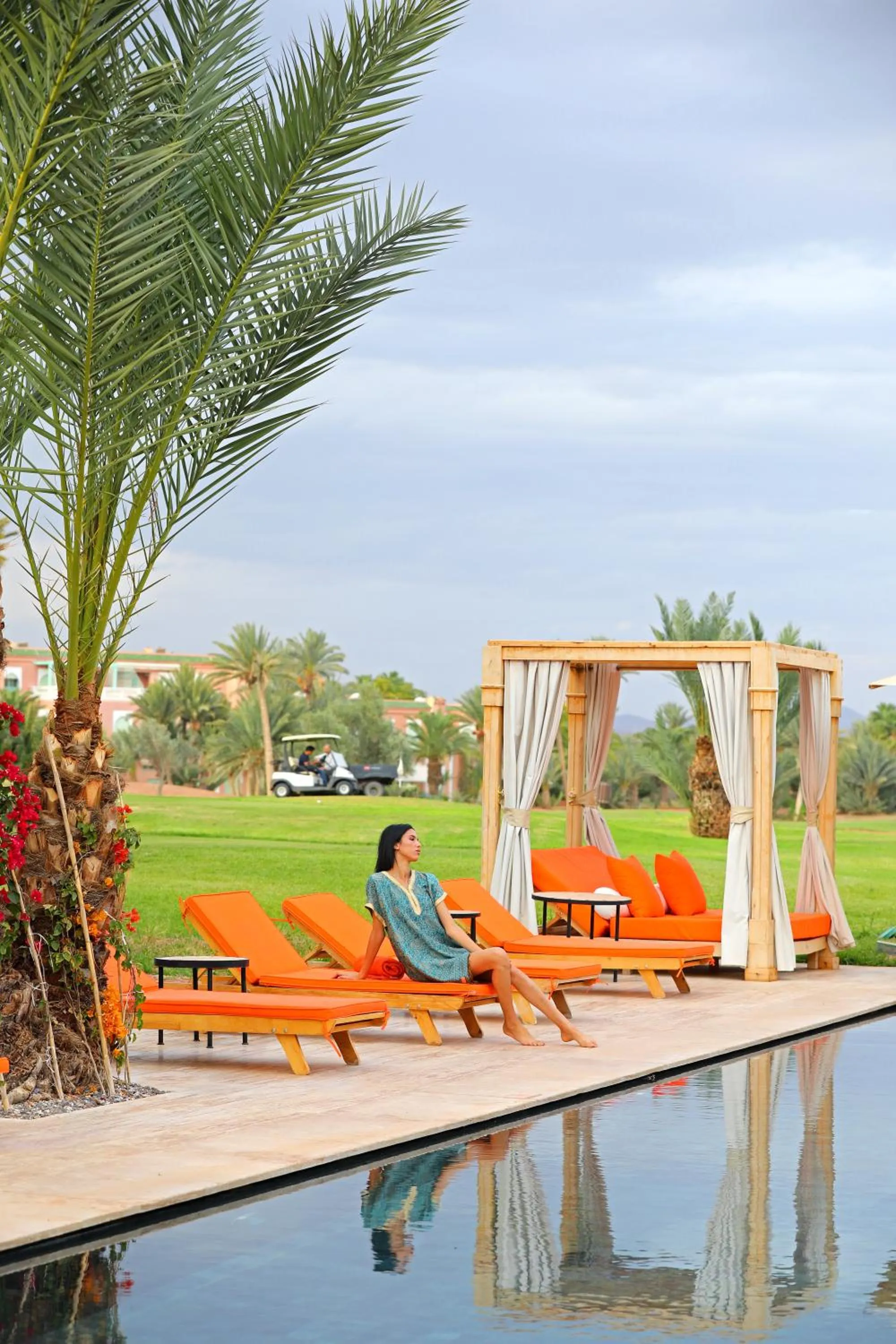 Communal lounge/ TV room in Pavillon du Golf - Palmeraie suites