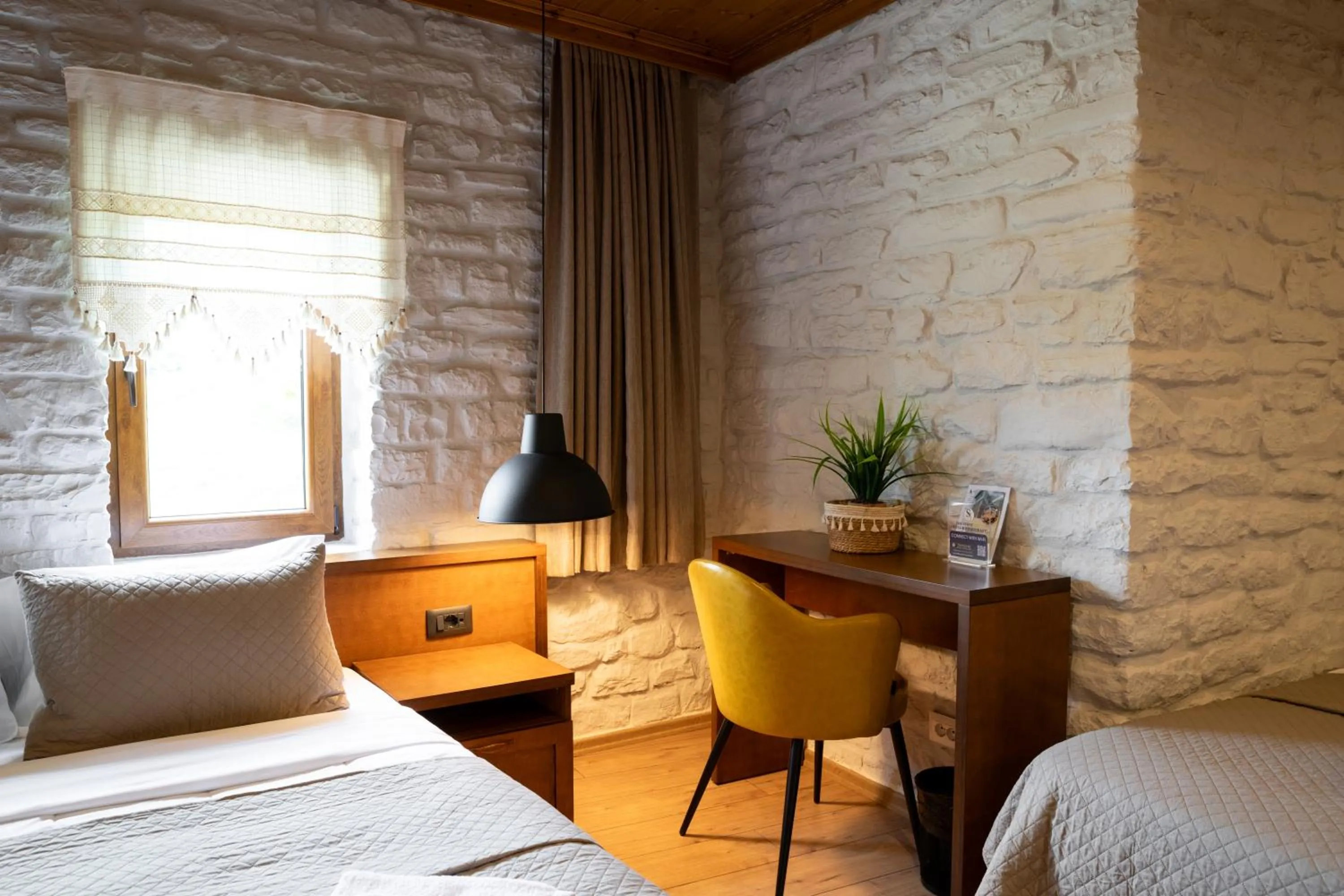 Bed in The Stone Sky Hotel