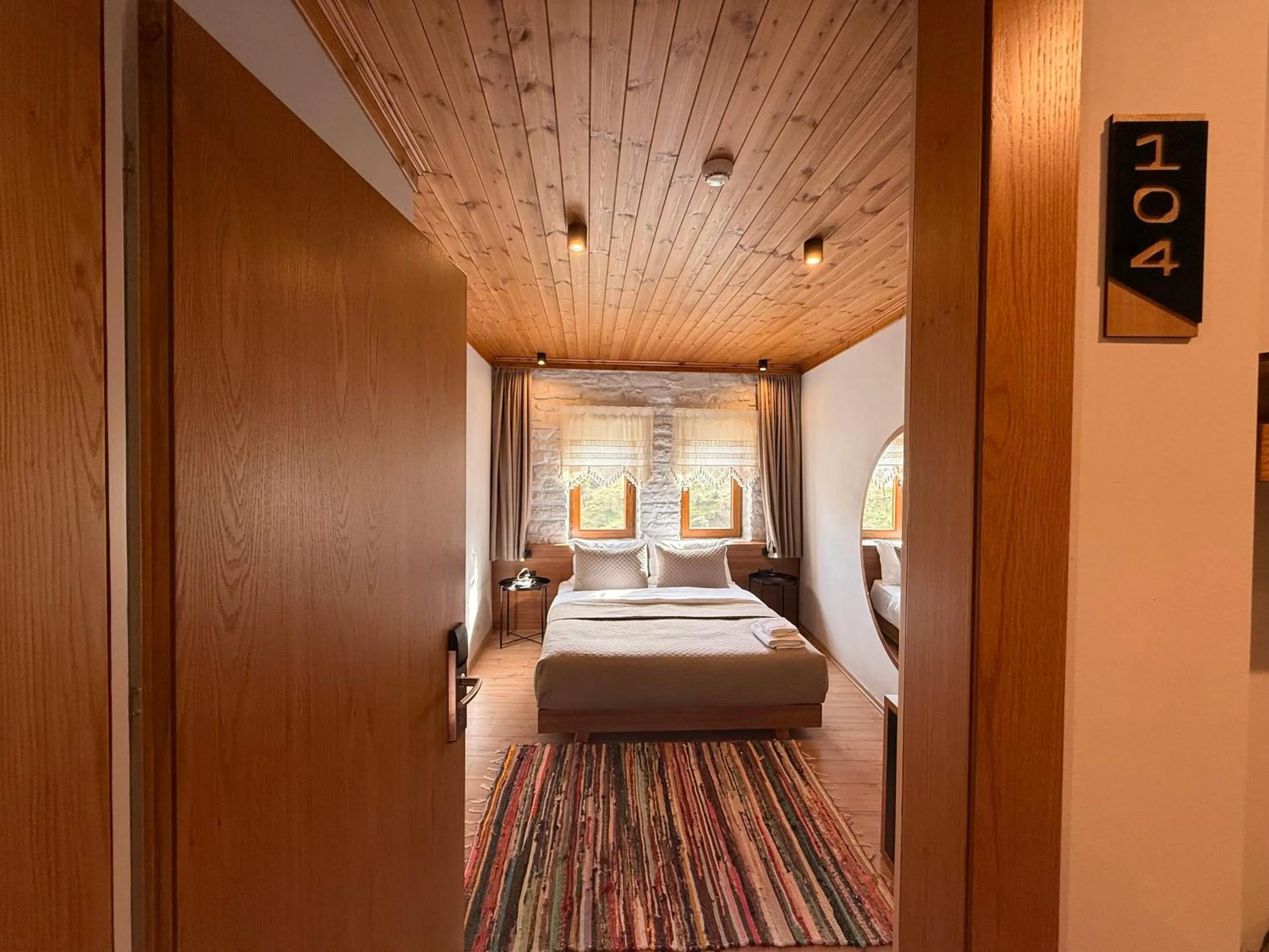 Bed in The Stone Sky Hotel