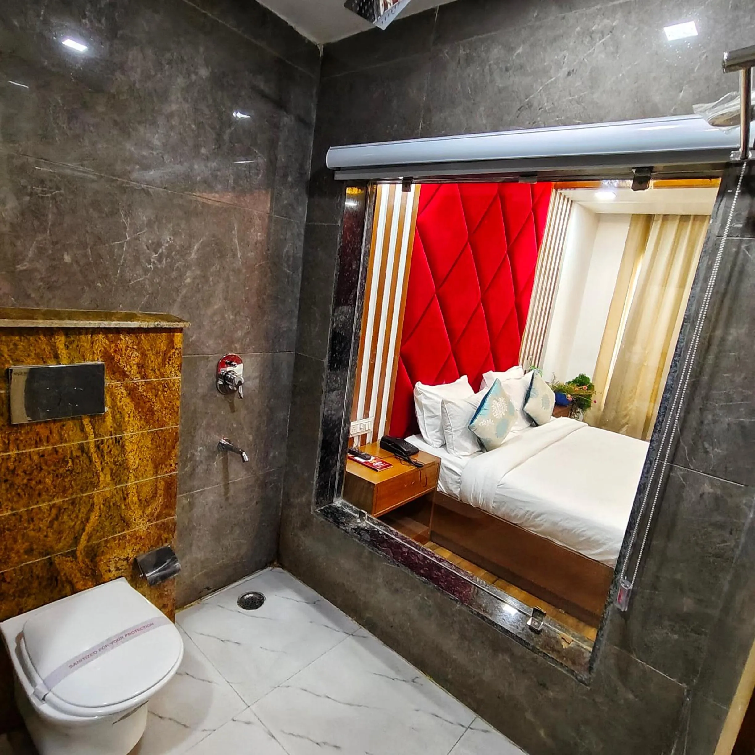 Bathroom, Bed in Rich Grand Hotel