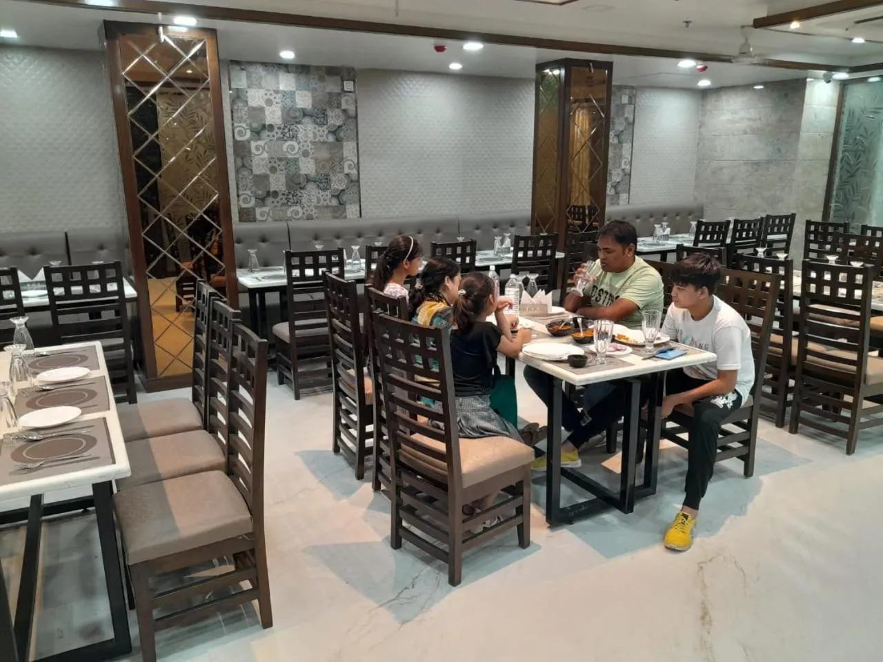 People in Rich Grand Hotel