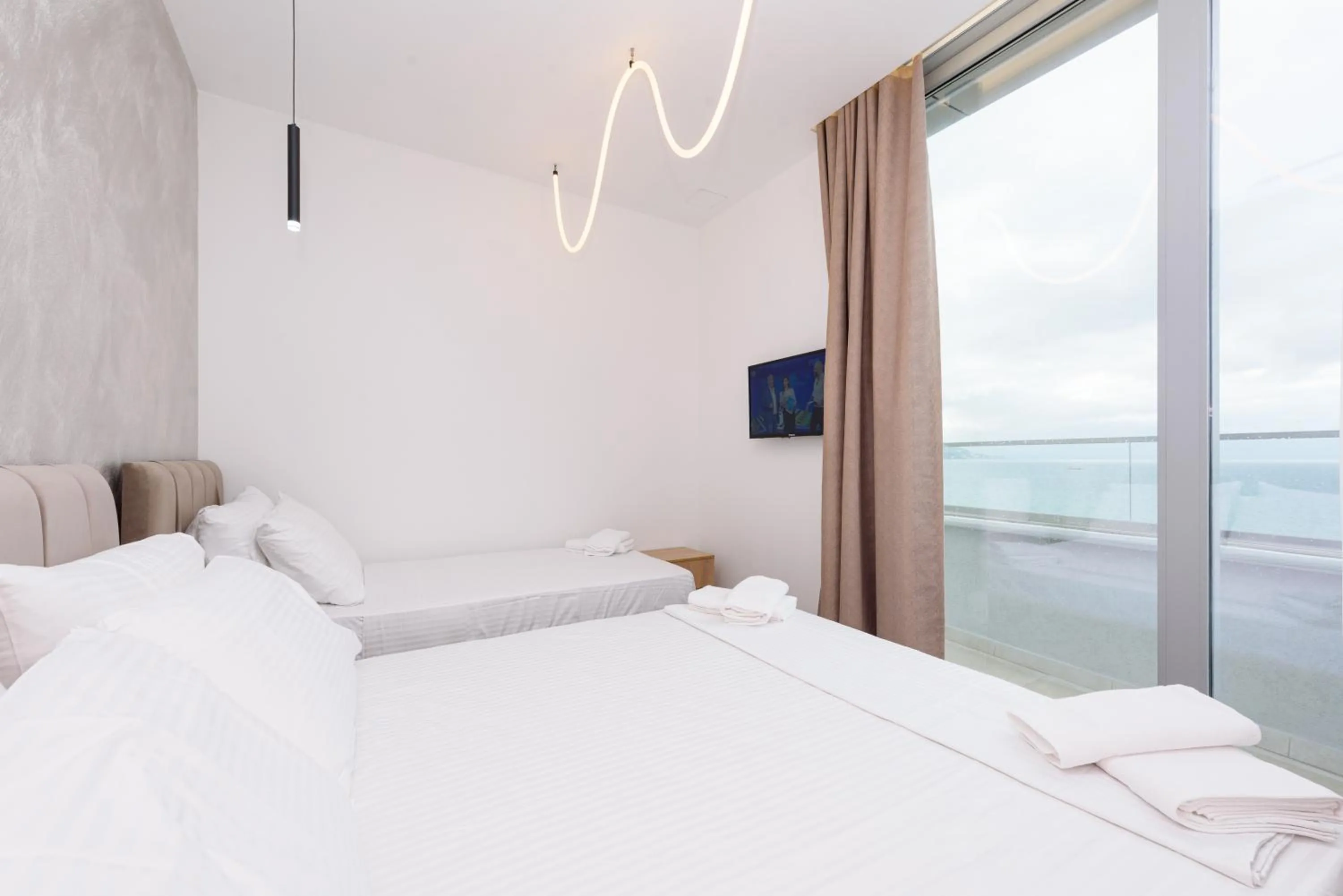 Bed in Sea & Sand Hotel